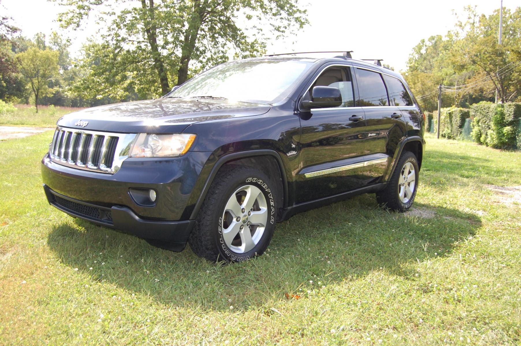 2011 Blue /Grey Leather Jeep Grand Cherokee Laredo 4WD (1J4RR4GG6BC) with an 3.6L V6 DOHC 24V engine, 5-Speed Automatic transmission, located at 6528 Lower York Road, New Hope, PA, 18938, (215) 862-9555, 40.358707, -74.977882 - Here we have a 2011 Grand Cherokee with a 3.6L V6 putting power to the ground via a 4X4 automatic transmission. The interior offers gray leather, cruise control, tilt steering wheel, power windows/locks/mirrors, heated seats, AM/FM/CD/AUX/USB radio, auto dimming mirrors, dual zone climate, drivers/p - Photo #0