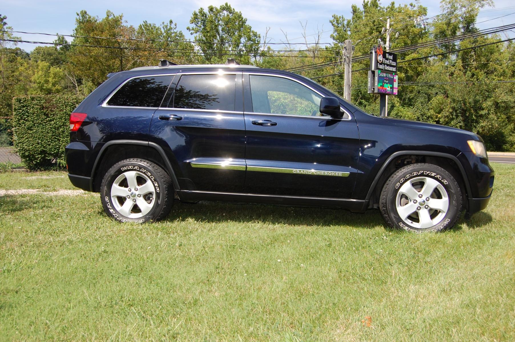 2011 Blue /Grey Leather Jeep Grand Cherokee Laredo 4WD (1J4RR4GG6BC) with an 3.6L V6 DOHC 24V engine, 5-Speed Automatic transmission, located at 6528 Lower York Road, New Hope, PA, 18938, (215) 862-9555, 40.358707, -74.977882 - Here we have a 2011 Grand Cherokee with a 3.6L V6 putting power to the ground via a 4X4 automatic transmission. The interior offers gray leather, cruise control, tilt steering wheel, power windows/locks/mirrors, heated seats, AM/FM/CD/AUX/USB radio, auto dimming mirrors, dual zone climate, drivers/p - Photo #2