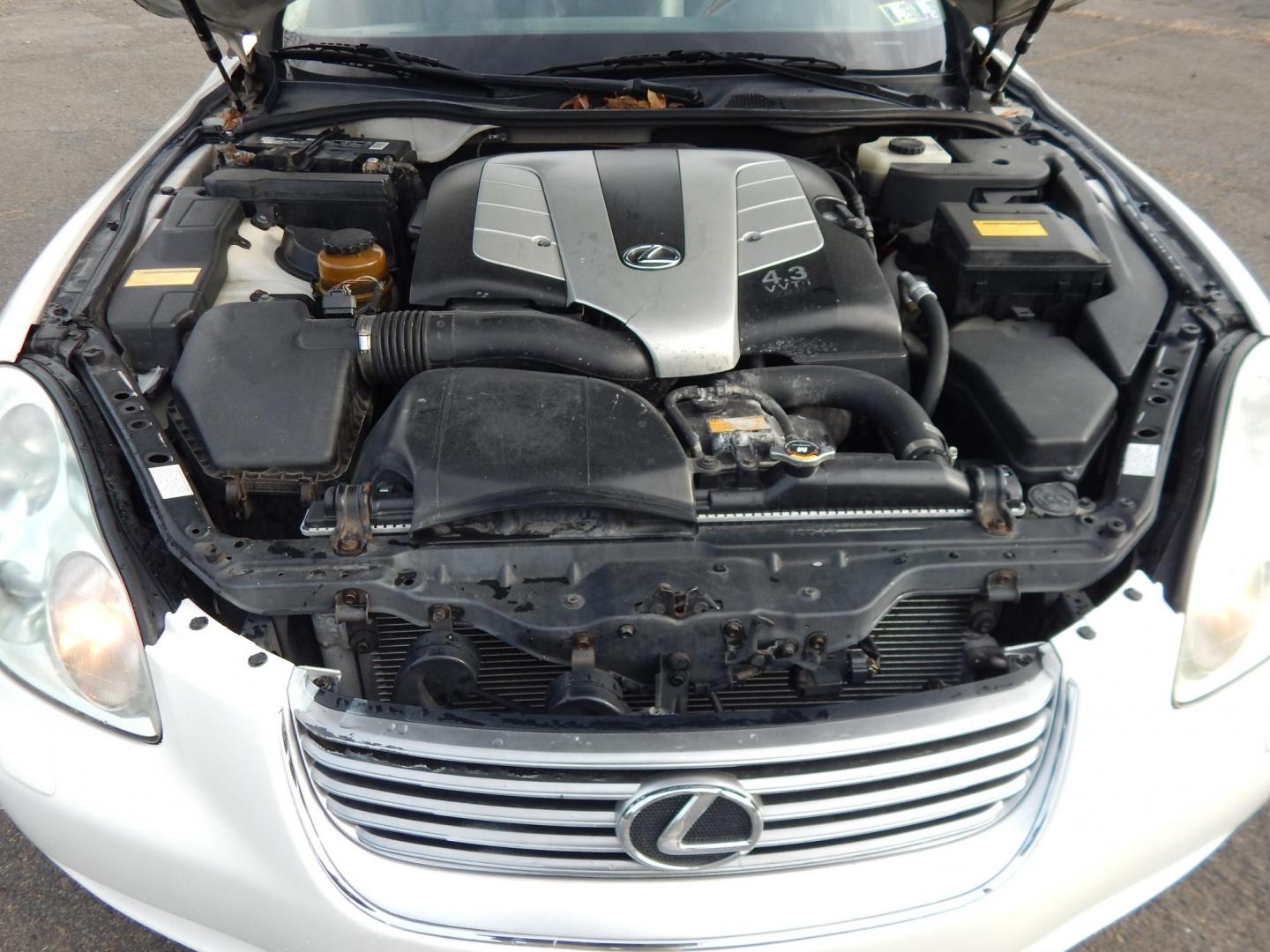 2005 Pearl White /Black leather Lexus SC 430 Convertible (JTHFN48Y650) with an 4.3L V8 DOHC 32V engine, 5-Speed Automatic Overdrive transmission, located at 6528 Lower York Road, New Hope, PA, 18938, (215) 862-9555, 40.358707, -74.977882 - Here for sale is a 2005 Lexus SC430 Convertible. Under the hood is strong running 4.3 liter V8 which puts power to the rear wheels via a smooth shifting automatic transmission. Features include; Black leather upholstery, wood trim, keyless entry, one master key, cruise control, tilt wheel, air co - Photo#19