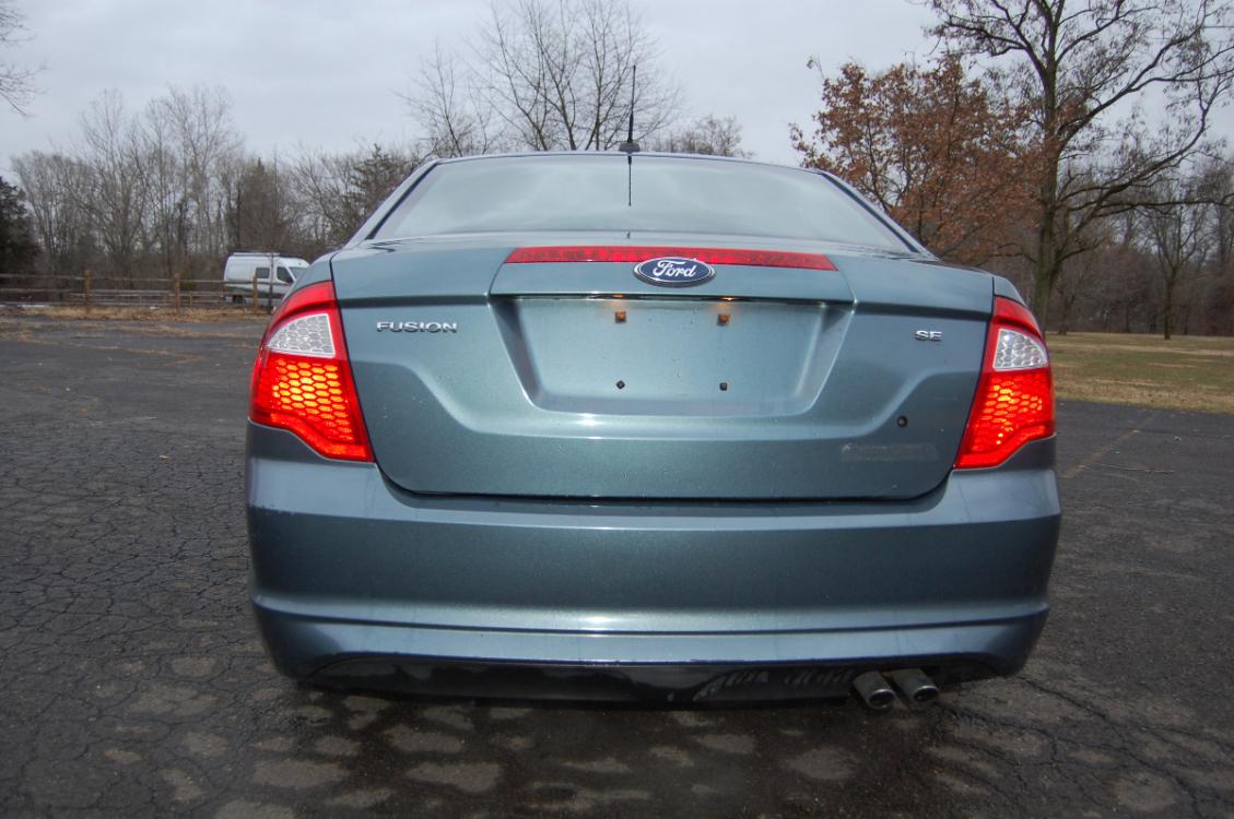 2012 Blue /Black Ford Fusion SE (3FAHP0HA5CR) with an 2.5L L4 DOHC 16V engine, Automatic transmission, located at 6528 Lower York Road, New Hope, PA, 18938, (215) 862-9555, 40.358707, -74.977882 - Photo #7