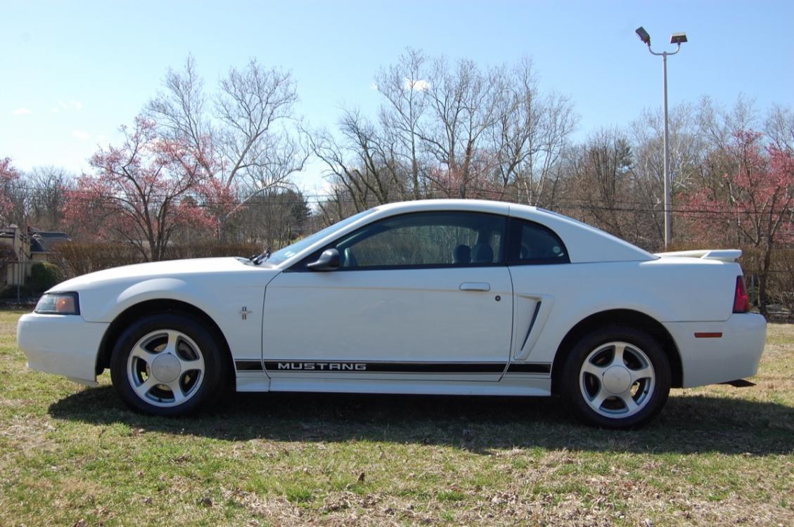 2002 White /Gray cloth Ford Mustang Deluxe Coupe (1FAFP40432F) with an 3.8L V6 OHV 12V engine, located at 6528 Lower York Road, New Hope, PA, 18938, (215) 862-9555, 40.358707, -74.977882 - Photo #1