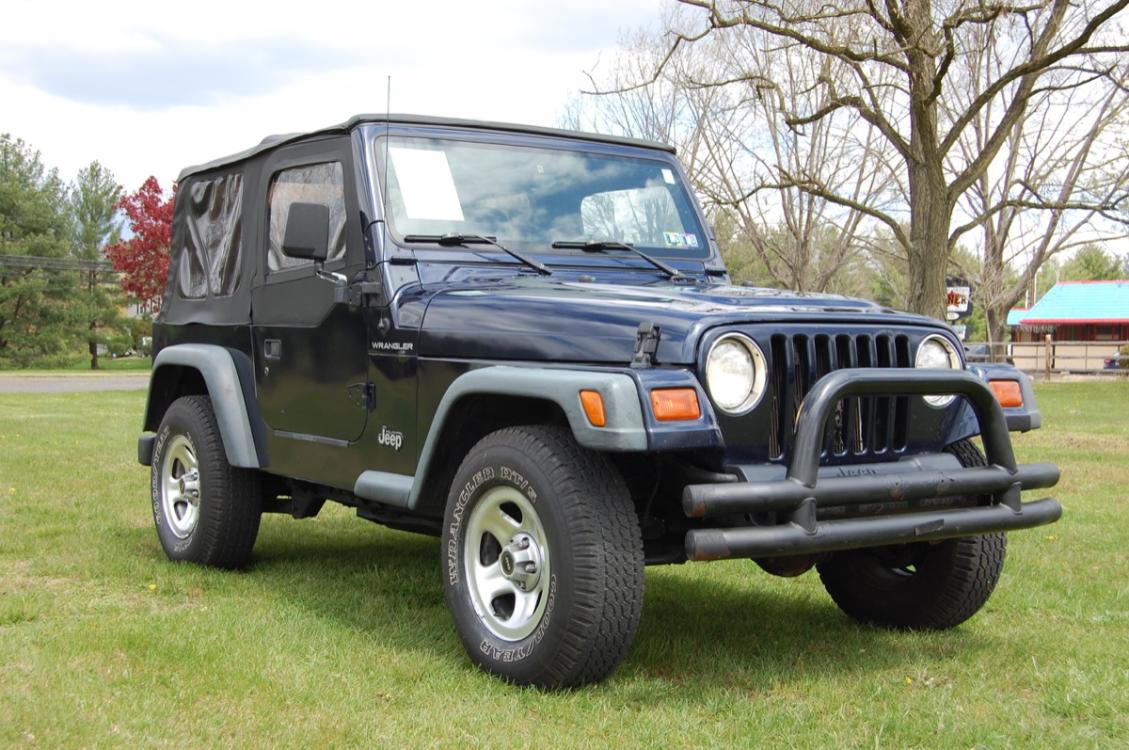 1997 Blue /Gray cloth Jeep Wrangler SE (1J4FY29P2VP) with an 2.5L L4 OHV 8V engine, 5-Speed Manual transmission, located at 6528 Lower York Road, New Hope, PA, 18938, (215) 862-9555, 40.358707, -74.977882 - Photo #6