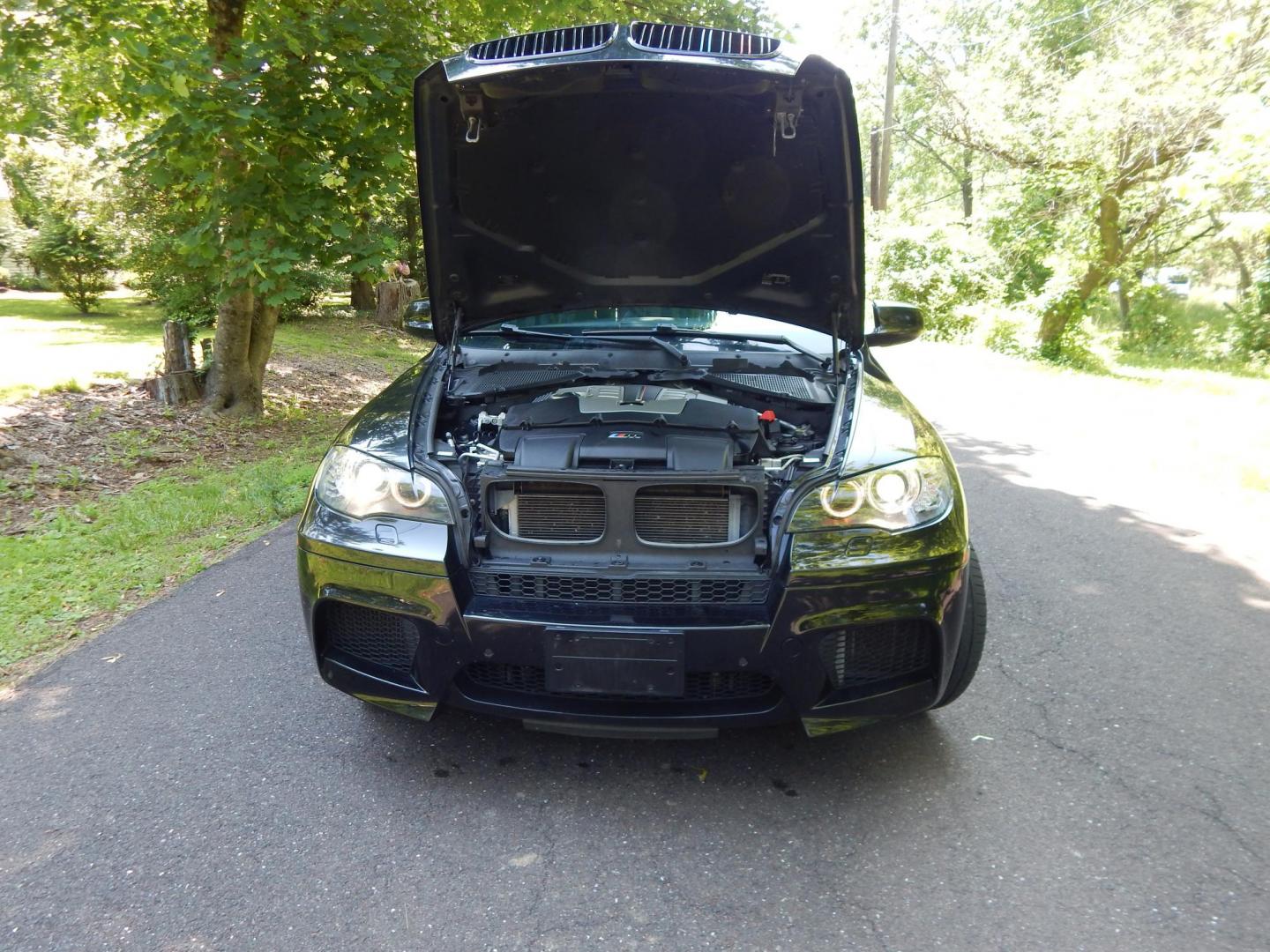 2012 Black /Black Leather BMW X5 M (5YMGY0C58CL) with an 4.4L V8 Twin Turbo engine, 6-Speed Automatic transmission, located at 6528 Lower York Road, New Hope, PA, 18938, (215) 862-9555, 40.358707, -74.977882 - Here for sale is a very cool 2012 BMW X5M. Under the hood is a strong running 4.4 liter twin turbo V8 producing 555 HP and puts that power to the intelligent AWD system via a smooth shifting automatic transmission with paddle shifters. Features include; Black leather upholstery, keyless entry syst - Photo#18