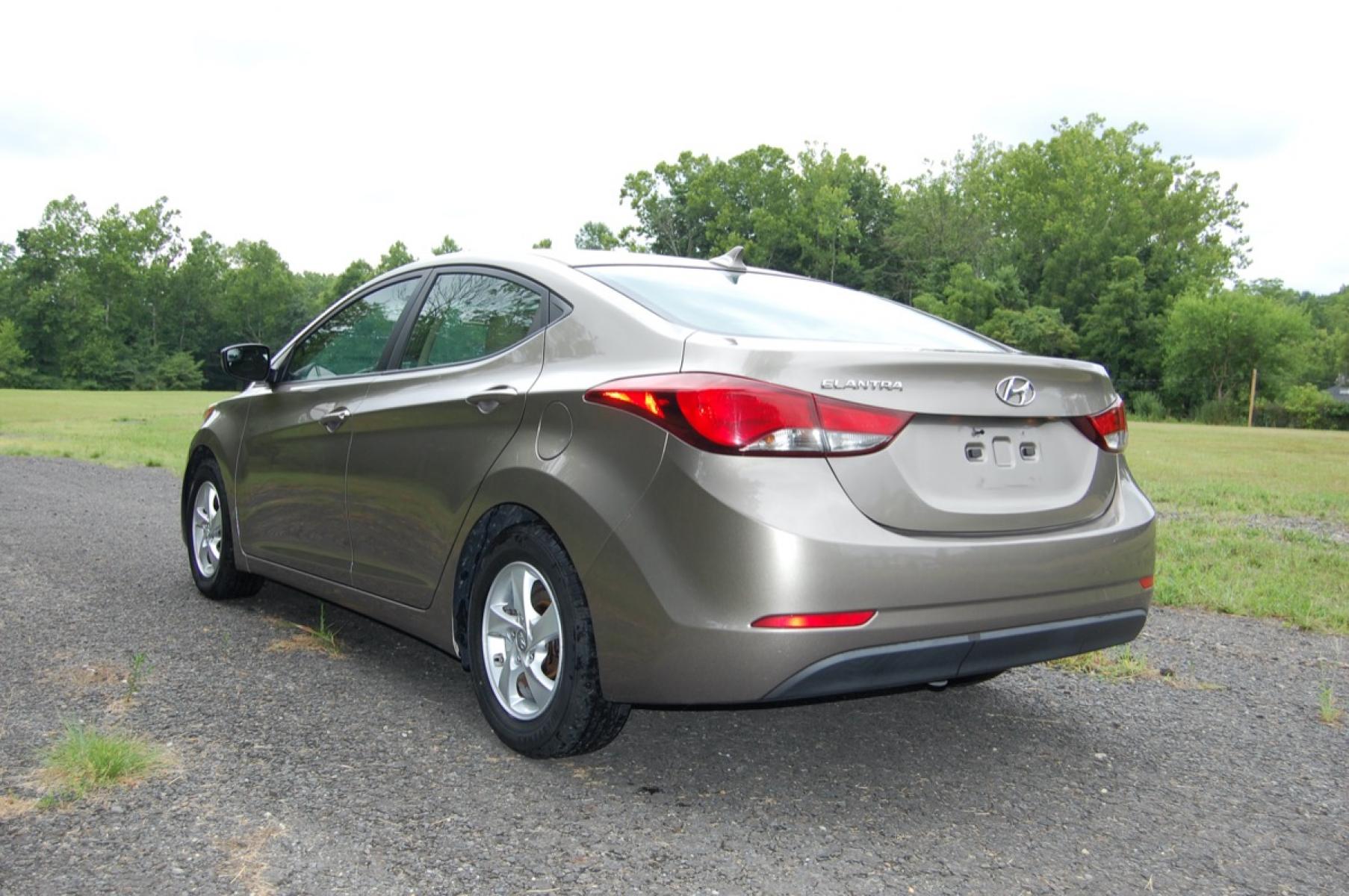 2014 Gold /Tan Cloth Hyundai Elantra (5NPDH4AE8EH) with an 1.8L L4 DOHC 16V engine, 6-Speed Manual transmission, located at 6528 Lower York Road, New Hope, PA, 18938, (215) 862-9555, 40.358707, -74.977882 - Photo #2