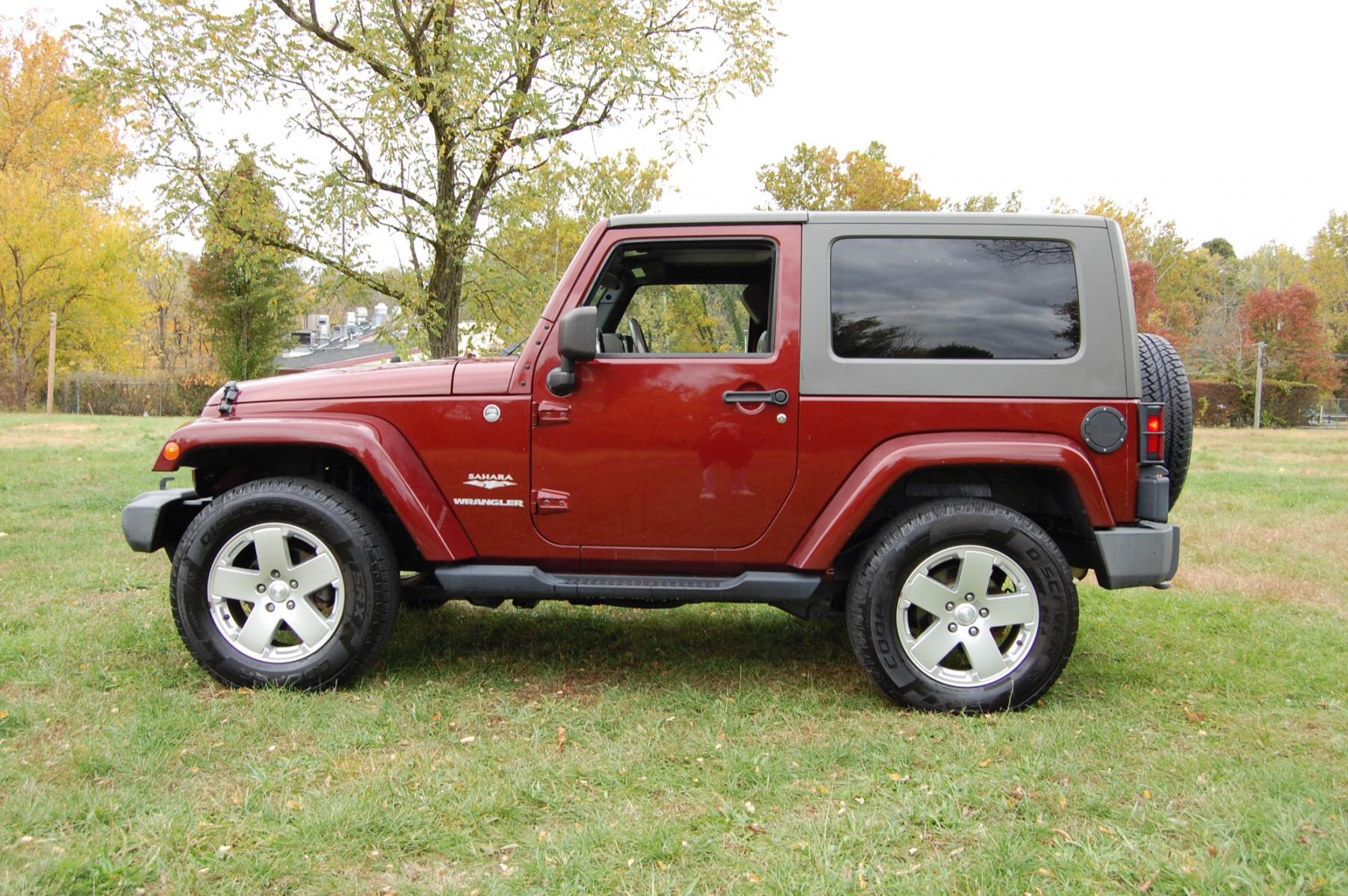 2010 Burgundy /Tan Leather Jeep Wrangler Sahara (1J4AA5D10AL) with an 3.8L V6 OHV 12V engine, Automatic transmission, located at 6528 Lower York Road, New Hope, PA, 18938, (215) 862-9555, 40.358707, -74.977882 - Photo #1