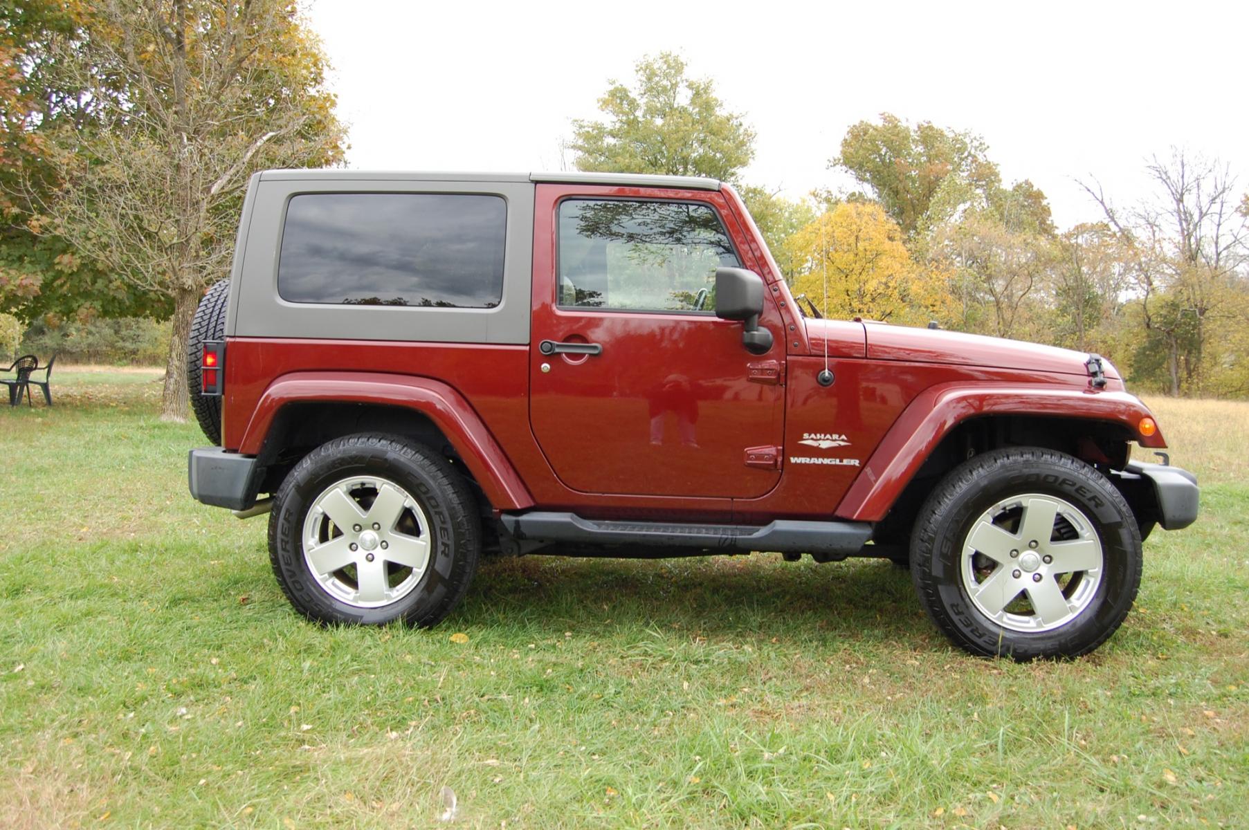 2010 Burgundy /Tan Leather Jeep Wrangler Sahara (1J4AA5D10AL) with an 3.8L V6 OHV 12V engine, Automatic transmission, located at 6528 Lower York Road, New Hope, PA, 18938, (215) 862-9555, 40.358707, -74.977882 - Photo #3