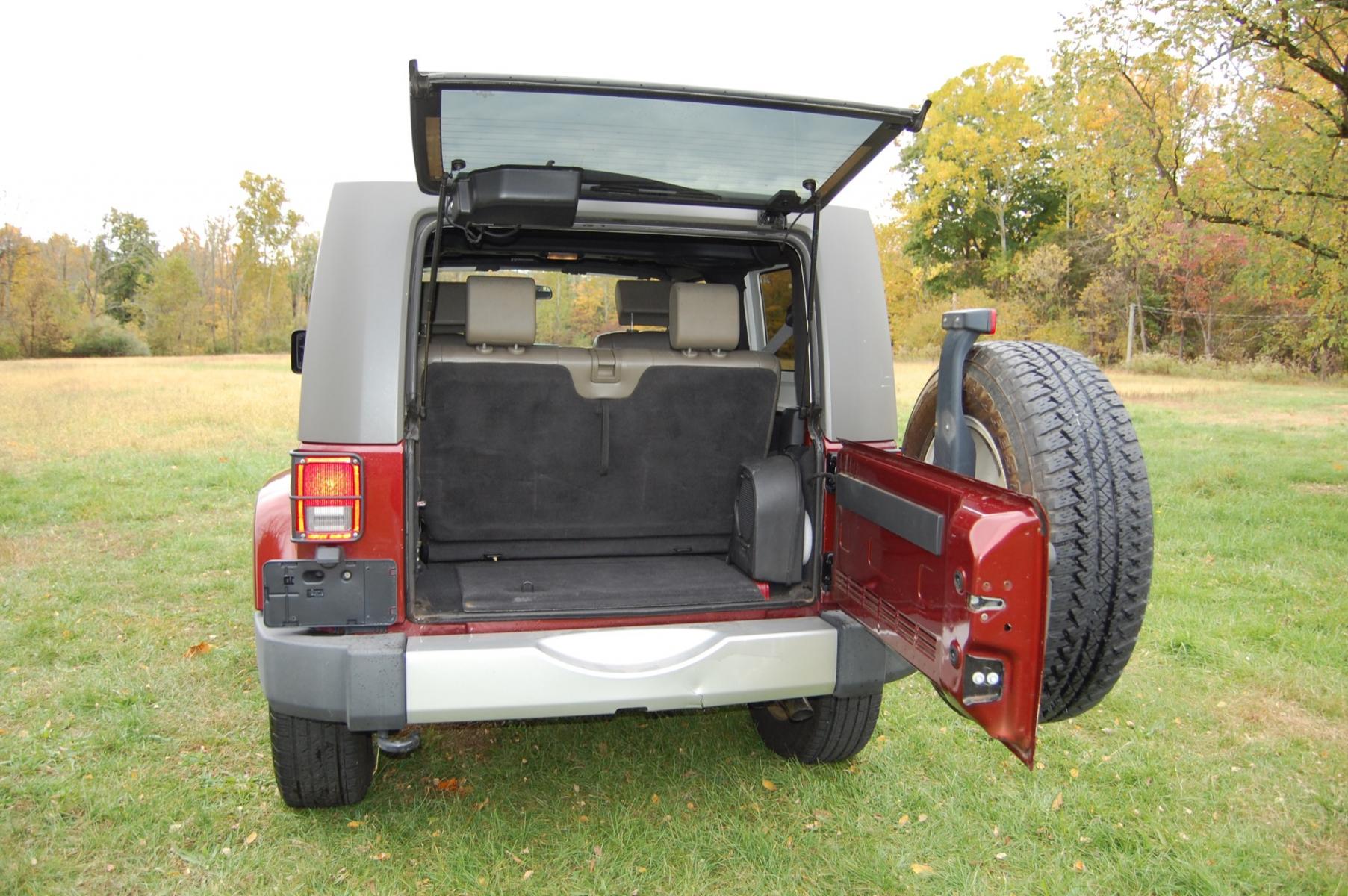 2010 Burgundy /Tan Leather Jeep Wrangler Sahara (1J4AA5D10AL) with an 3.8L V6 OHV 12V engine, Automatic transmission, located at 6528 Lower York Road, New Hope, PA, 18938, (215) 862-9555, 40.358707, -74.977882 - Photo #8