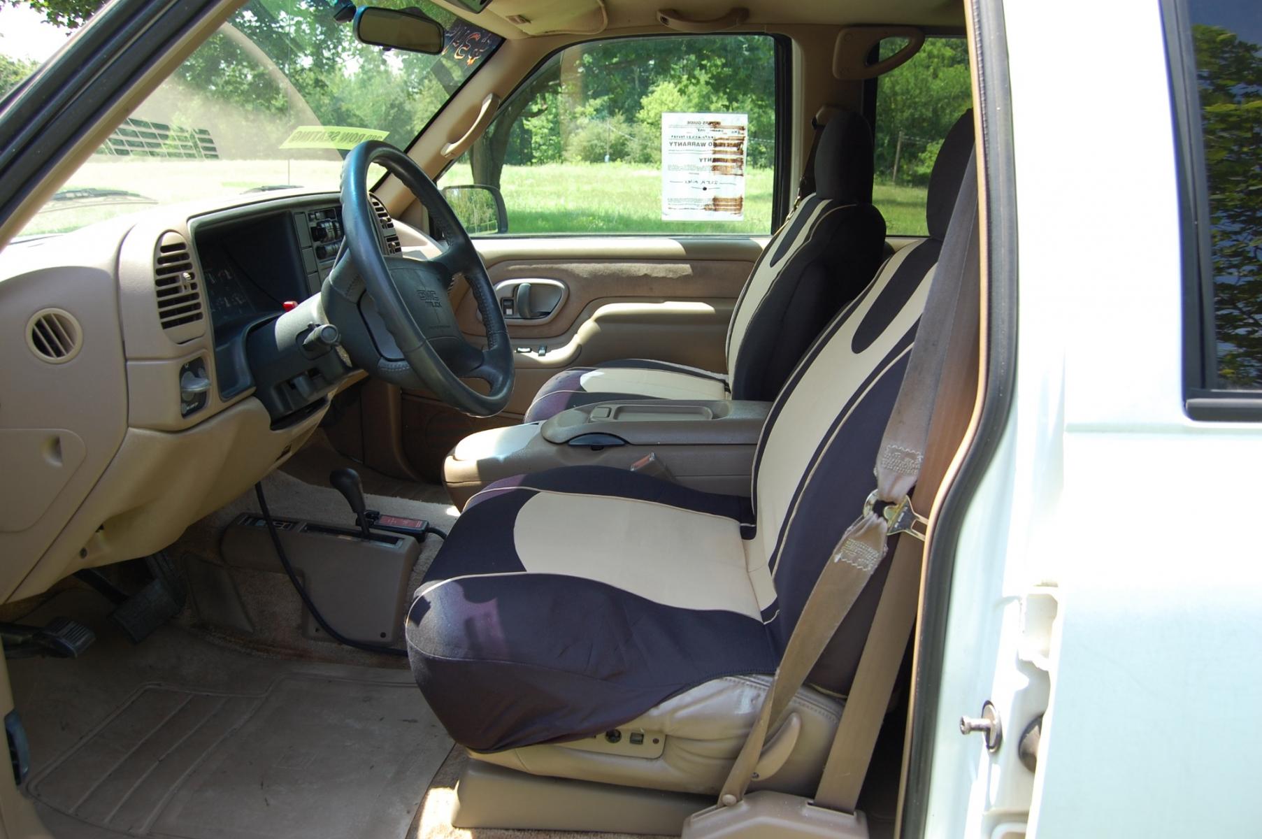 1995 White /tan GMC Suburban 1500 4WD (1GKFK16K2SJ) with an 5.7L V8 OHV 16V engine, 4-Speed Automatic Overdrive transmission, located at 6528 Lower York Road, New Hope, PA, 18938, (215) 862-9555, 40.358707, -74.977882 - This 1995 GMC 1500 Suburban SLT puts power to the ground via a 5.7L V8 with an automatic transmission with four wheel drive. The outside of this vehicle has a 9 foot Hiniker snow plow, white paint, running boards, 16 inch wheels, rain guards, rear barn doors, tow package and a roof rack. The interio - Photo #48