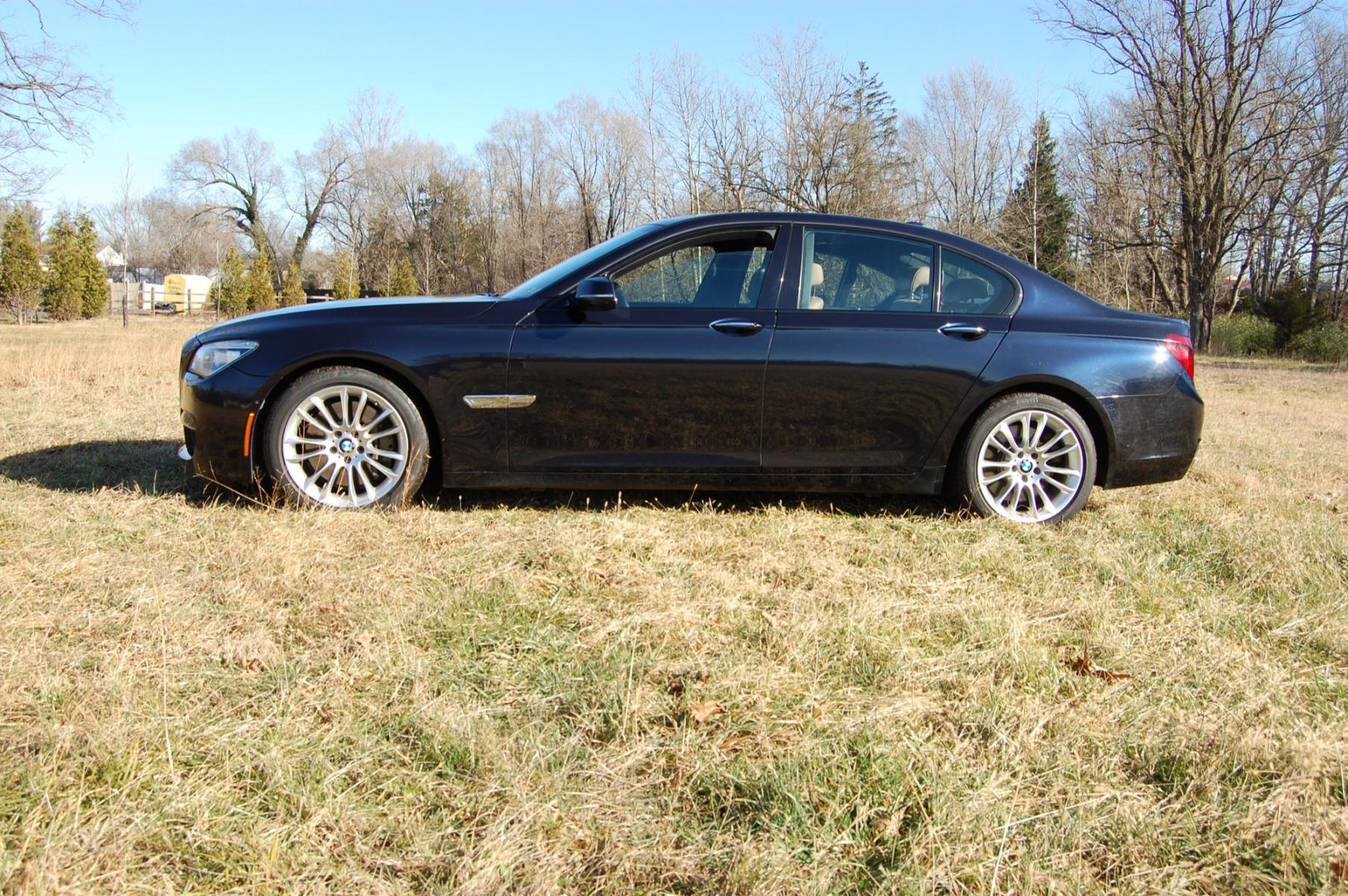 2015 Dark Blue /Tan Leather BMW 7-Series M-Sport Drive (WBAYB6C51FD) with an 4.4L V8 DOHC 32V TURBO engine, 8-Speed Automatic transmission, located at 6528 Lower York Road, New Hope, PA, 18938, (215) 862-9555, 40.358707, -74.977882 - Photo #1