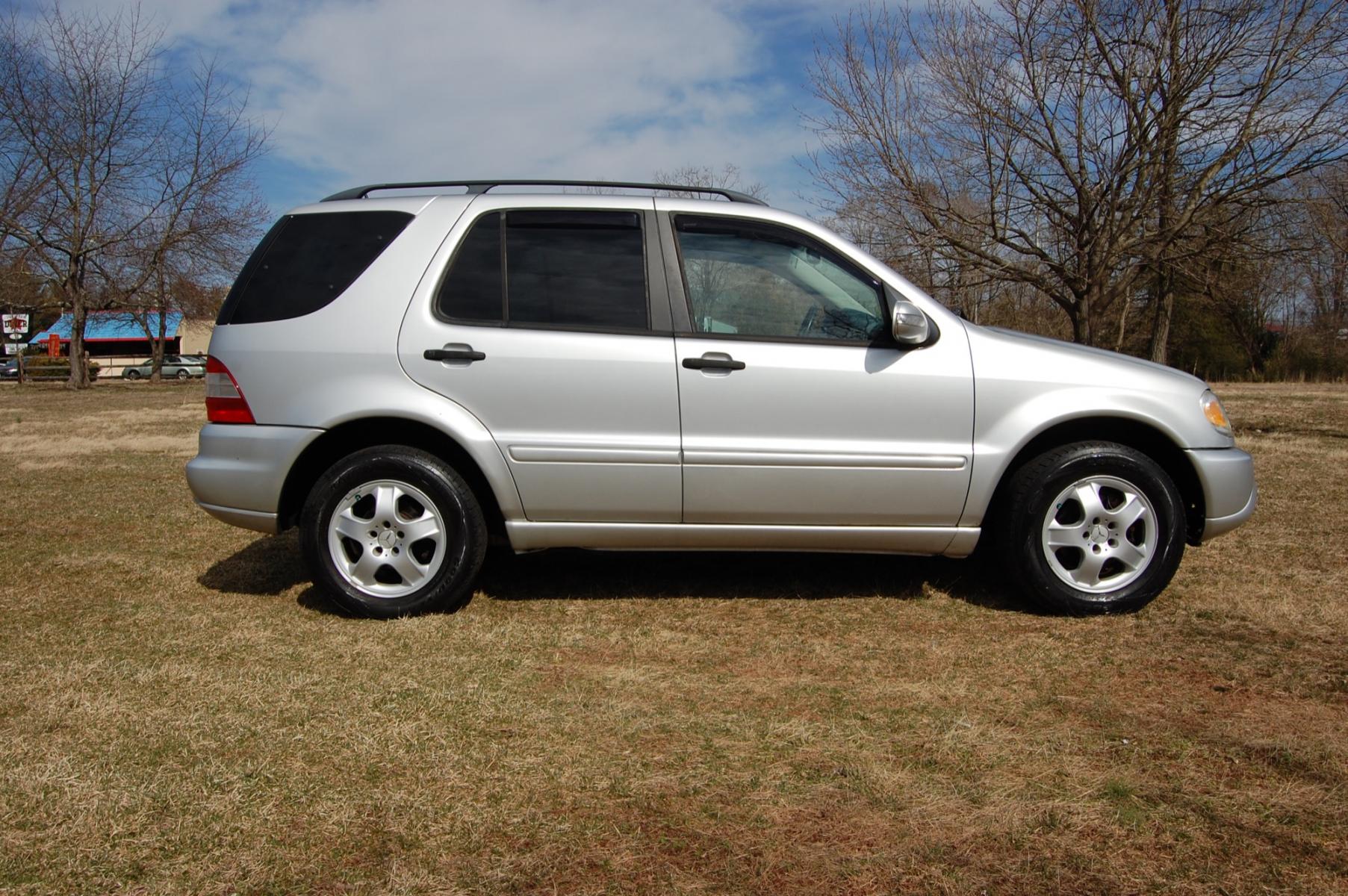 2005 Silver /Black leather Mercedes-Benz M-Class ML350 (4JGAB57E35A) with an 3.7L V6 SOHC 18V engine, 5-Speed Automatic Overdrive transmission, located at 6528 Lower York Road, New Hope, PA, 18938, (215) 862-9555, 40.358707, -74.977882 - Here for sale is a 2005 Mercedes-Benz ML350. Under the hood is a strong running 3.7 liter V6 which puts power to the AWD system via a smooth shifting automatic transmission. Features include; Black leather interior in great shape, wood grain trim, one key, cruise control, tilt steering wheel, pow - Photo #4