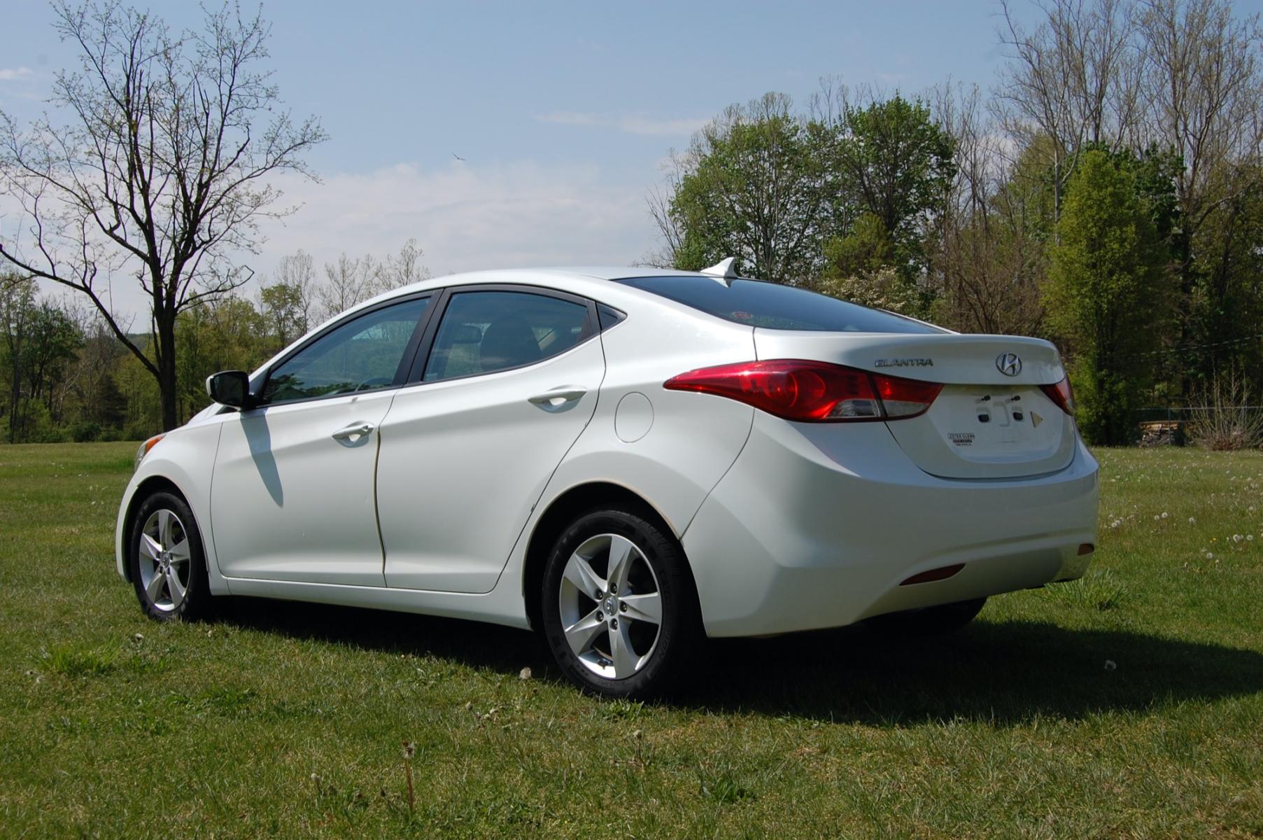 2012 White /Tan Hyundai Elantra GLS (5NPDH4AE5CH) with an 1.8L L4 DOHC 16V engine, 6-Speed Automatic transmission, located at 6528 Lower York Road, New Hope, PA, 18938, (215) 862-9555, 40.358707, -74.977882 - This Hyundai has a 1.8L 4 cylinder engine putting power to the front wheels via an automatic transmission. The interior offers tan cloth, tilt steering wheel, cruise control, eco mode, AM/FM/BLUETOOTH/AUX radio, drivers/passenger front airbags and side curtain airbags for safety, heat/ac and power w - Photo #2
