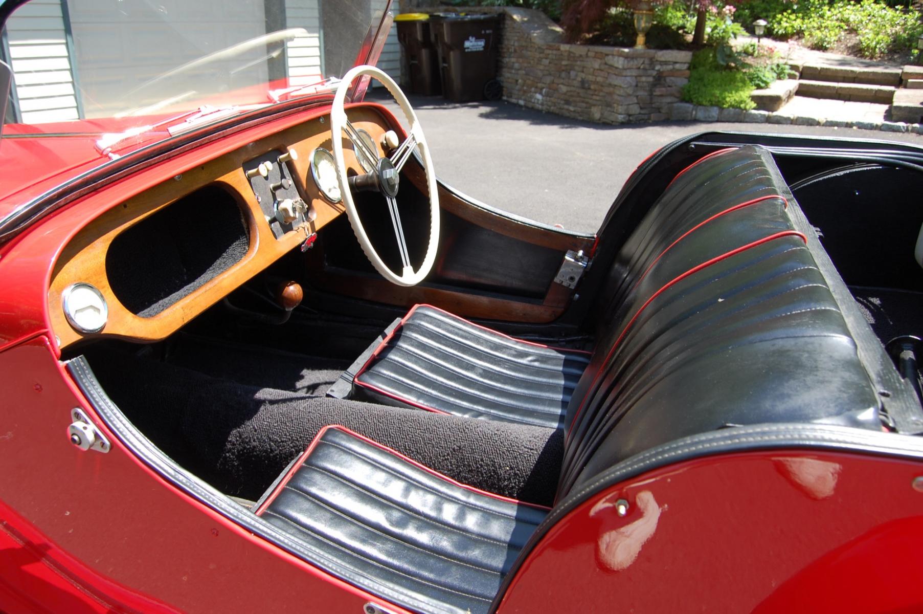 1958 RED /Black vinyl w/red piping Morgan 4/4 series 2 (A329) , 3 speed manual transmission, located at 6528 Lower York Road, New Hope, PA, 18938, (215) 862-9555, 40.358707, -74.977882 - Here we have a Morgan 4/4 series 2 fitted with a 4 cylinder Ford engine. This vehicle has a manual transmission that puts power to the rear wheels. Inside offers black vinyl with red piping. This vehicle starts and drivers great. This car does not have a top on it. 5.25-16 ply tires. We have plenty - Photo #9