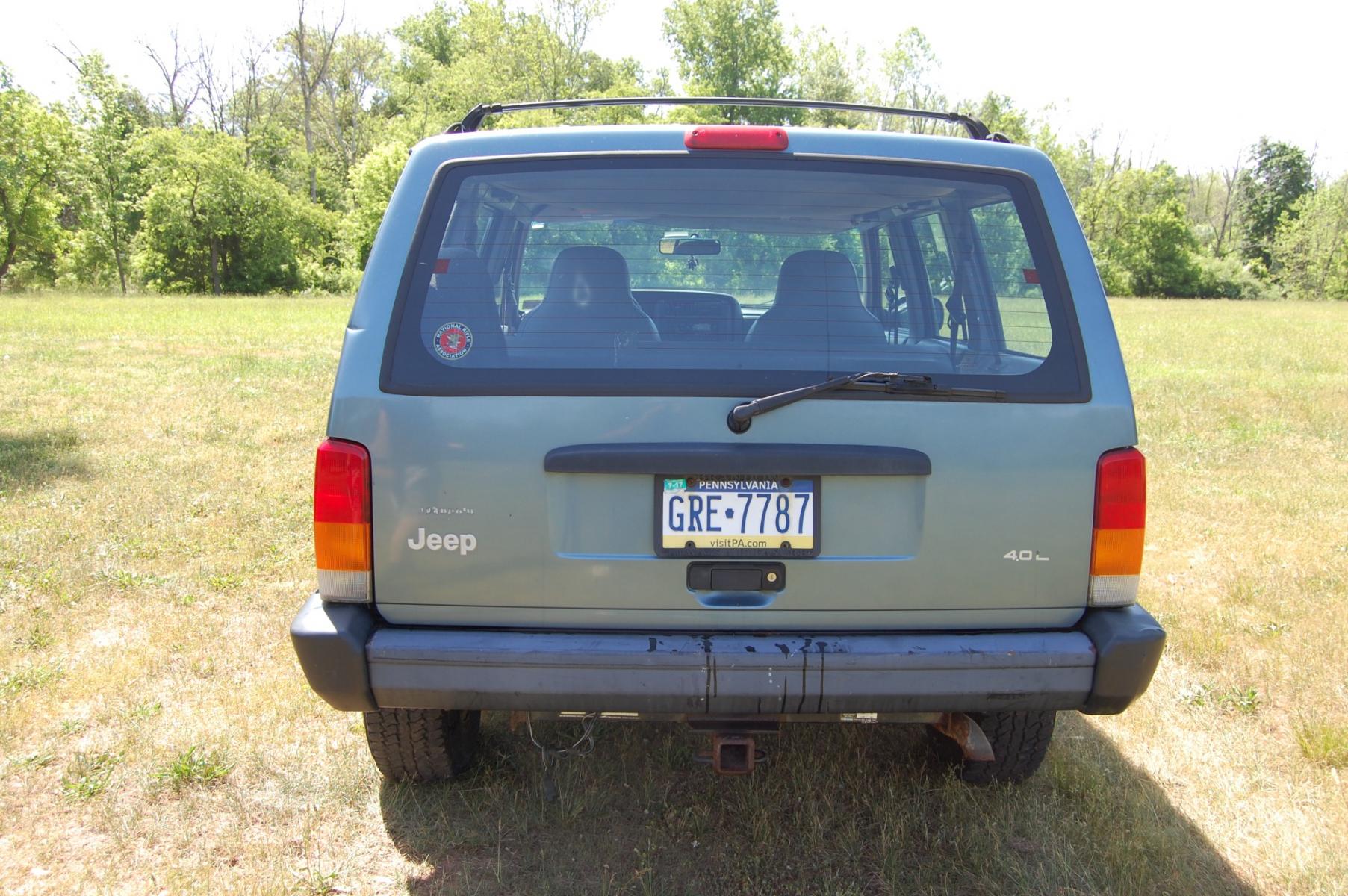 1998 Blue /Grey Jeep Cherokee Sport 4-Door 4WD (1J4FJ68S2WL) with an 4.0L L6 OHV 12V engine, Automatic transmission, located at 6528 Lower York Road, New Hope, PA, 18938, (215) 862-9555, 40.358707, -74.977882 - Here for sale is a 1998 Jeep Cherokee, has a 4.0 Liter straight six cylinder engine putting power to all 4 wheels via automatic transmission. The interior offers gray cloth, heat/AC, rear defrost, AM/FM/tape/CD sound system. Tilt wheel, power windows, locks and mirrors. Dual front air bags. Exteri - Photo #13