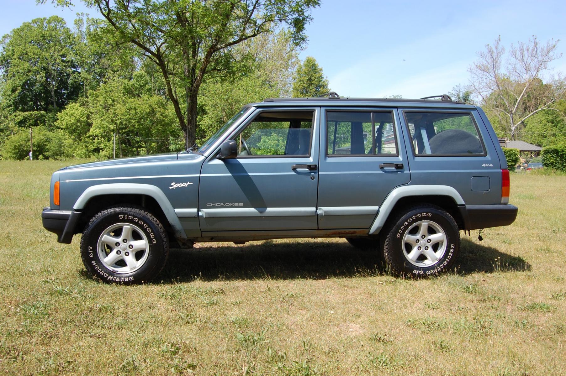 1998 Blue /Grey Jeep Cherokee Sport 4-Door 4WD (1J4FJ68S2WL) with an 4.0L L6 OHV 12V engine, Automatic transmission, located at 6528 Lower York Road, New Hope, PA, 18938, (215) 862-9555, 40.358707, -74.977882 - Here for sale is a 1998 Jeep Cherokee, has a 4.0 Liter straight six cylinder engine putting power to all 4 wheels via automatic transmission. The interior offers gray cloth, heat/AC, rear defrost, AM/FM/tape/CD sound system. Tilt wheel, power windows, locks and mirrors. Dual front air bags. Exteri - Photo #1