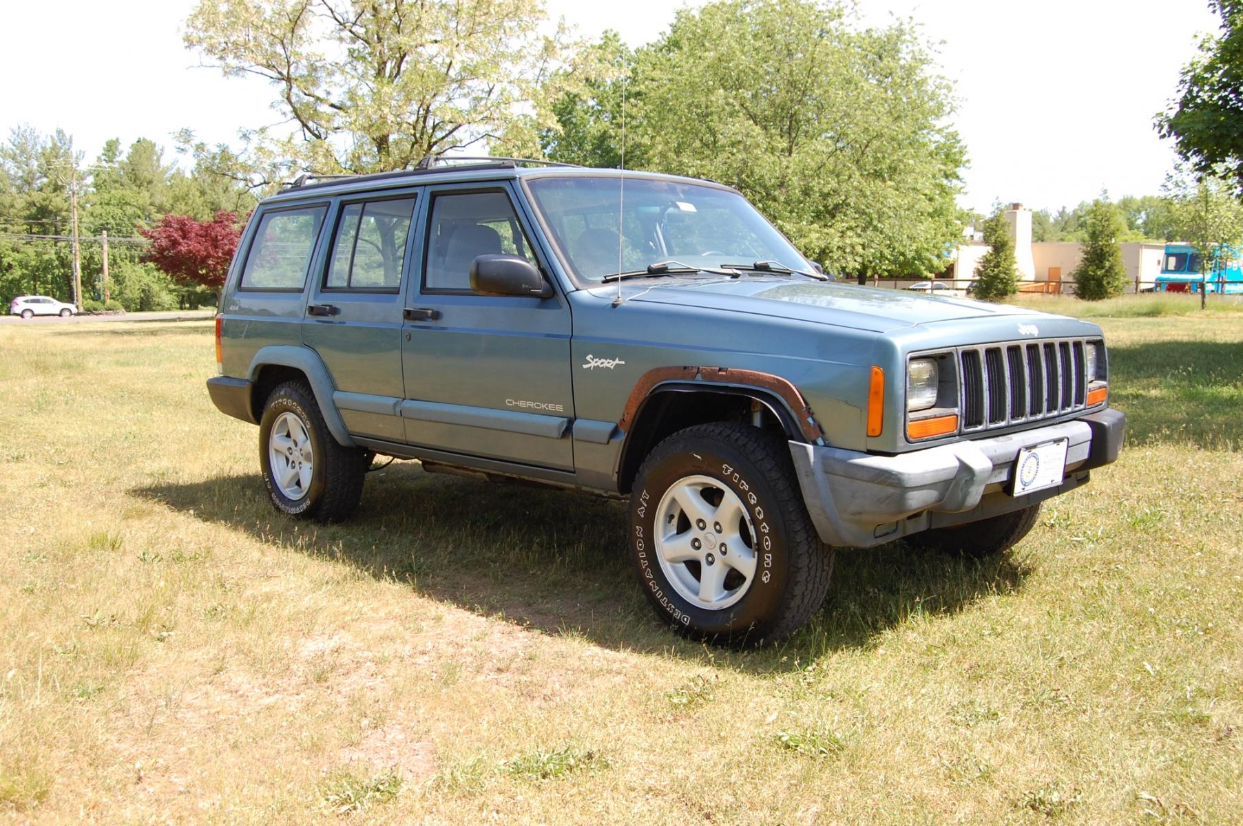 1998 Blue /Grey Jeep Cherokee Sport 4-Door 4WD (1J4FJ68S2WL) with an 4.0L L6 OHV 12V engine, Automatic transmission, located at 6528 Lower York Road, New Hope, PA, 18938, (215) 862-9555, 40.358707, -74.977882 - Here for sale is a 1998 Jeep Cherokee, has a 4.0 Liter straight six cylinder engine putting power to all 4 wheels via automatic transmission. The interior offers gray cloth, heat/AC, rear defrost, AM/FM/tape/CD sound system. Tilt wheel, power windows, locks and mirrors. Dual front air bags. Exteri - Photo #2
