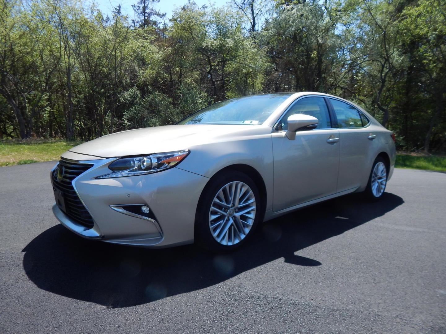 2016 Gold /Tan Lexus ES 350 Sedan (58ABK1GG0GU) with an 3.5L V6 DOHC 24V engine, 6A transmission, located at 6528 Lower York Road, New Hope, PA, 18938, (215) 862-9555, 40.358707, -74.977882 - Here we have a beautiful Lexus ES350 with 36k original miles! This Lexus has a 3.5L V6 putting power to the ground via a FWD automatic transmission. Options include: tan/brown leather with wood trim, heated and cooled front seats, heated steering wheel, AM/FM/CD/SAT/BLUETOOTH radio, navigation, back - Photo#0
