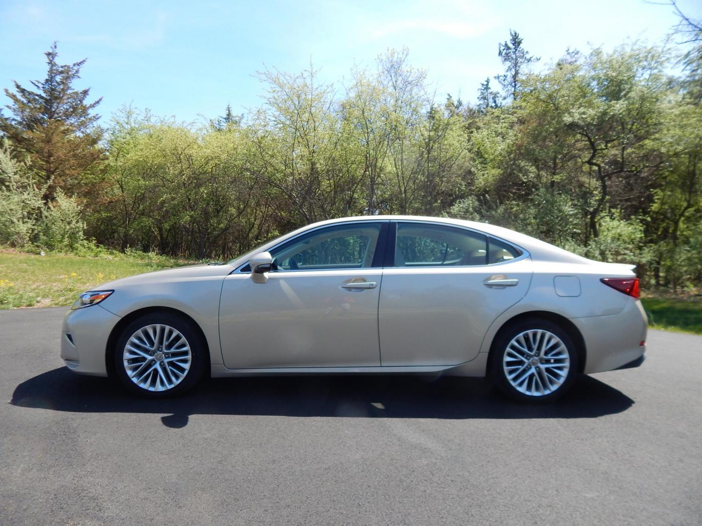 2016 Gold /Tan Lexus ES 350 Sedan (58ABK1GG0GU) with an 3.5L V6 DOHC 24V engine, 6A transmission, located at 6528 Lower York Road, New Hope, PA, 18938, (215) 862-9555, 40.358707, -74.977882 - Here we have a beautiful Lexus ES350 with 36k original miles! This Lexus has a 3.5L V6 putting power to the ground via a FWD automatic transmission. Options include: tan/brown leather with wood trim, heated and cooled front seats, heated steering wheel, AM/FM/CD/SAT/BLUETOOTH radio, navigation, back - Photo#1