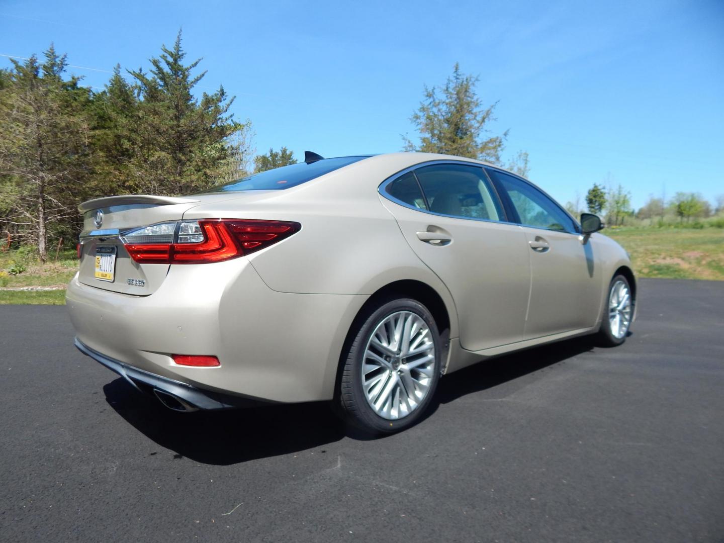 2016 Gold /Tan Lexus ES 350 Sedan (58ABK1GG0GU) with an 3.5L V6 DOHC 24V engine, 6A transmission, located at 6528 Lower York Road, New Hope, PA, 18938, (215) 862-9555, 40.358707, -74.977882 - Here we have a beautiful Lexus ES350 with 36k original miles! This Lexus has a 3.5L V6 putting power to the ground via a FWD automatic transmission. Options include: tan/brown leather with wood trim, heated and cooled front seats, heated steering wheel, AM/FM/CD/SAT/BLUETOOTH radio, navigation, back - Photo#5