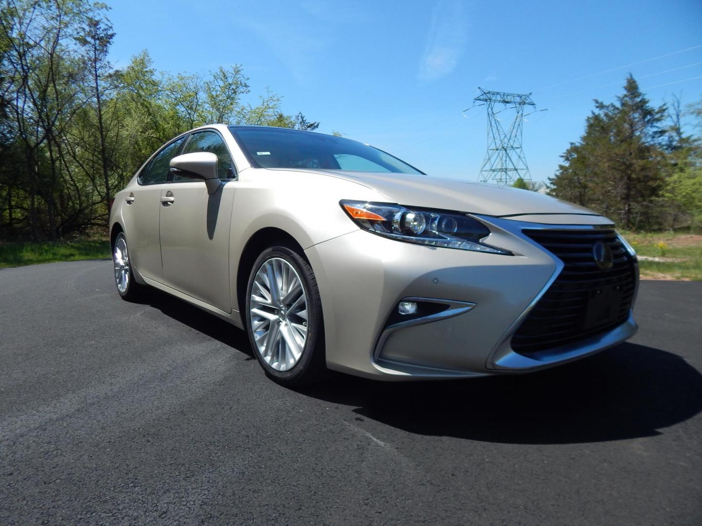 2016 Gold /Tan Lexus ES 350 Sedan (58ABK1GG0GU) with an 3.5L V6 DOHC 24V engine, 6A transmission, located at 6528 Lower York Road, New Hope, PA, 18938, (215) 862-9555, 40.358707, -74.977882 - Here we have a beautiful Lexus ES350 with 36k original miles! This Lexus has a 3.5L V6 putting power to the ground via a FWD automatic transmission. Options include: tan/brown leather with wood trim, heated and cooled front seats, heated steering wheel, AM/FM/CD/SAT/BLUETOOTH radio, navigation, back - Photo#7