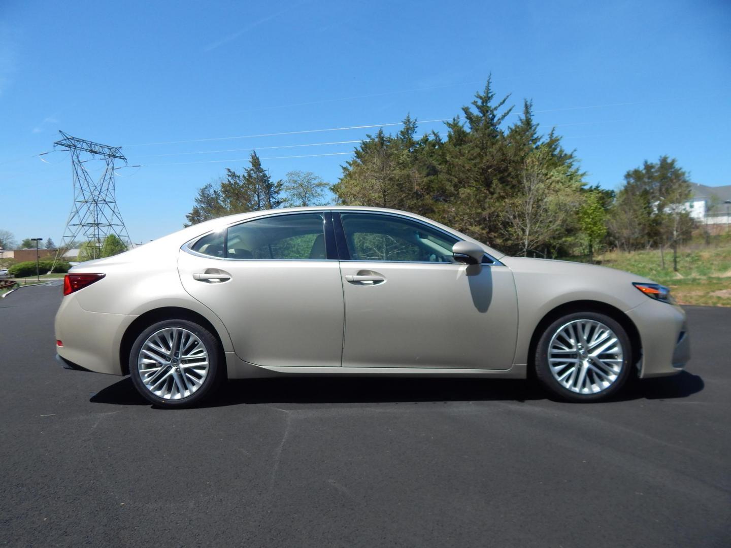 2016 Gold /Tan Lexus ES 350 Sedan (58ABK1GG0GU) with an 3.5L V6 DOHC 24V engine, 6A transmission, located at 6528 Lower York Road, New Hope, PA, 18938, (215) 862-9555, 40.358707, -74.977882 - Here we have a beautiful Lexus ES350 with 36k original miles! This Lexus has a 3.5L V6 putting power to the ground via a FWD automatic transmission. Options include: tan/brown leather with wood trim, heated and cooled front seats, heated steering wheel, AM/FM/CD/SAT/BLUETOOTH radio, navigation, back - Photo#6