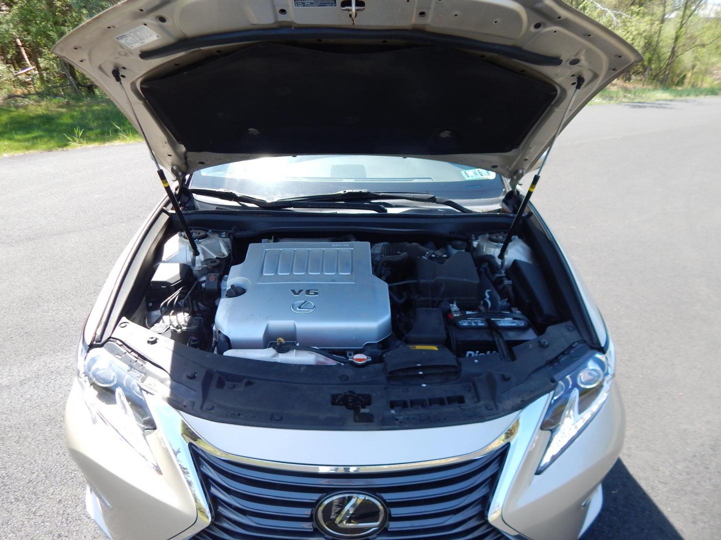 2016 Gold /Tan Lexus ES 350 Sedan (58ABK1GG0GU) with an 3.5L V6 DOHC 24V engine, 6A transmission, located at 6528 Lower York Road, New Hope, PA, 18938, (215) 862-9555, 40.358707, -74.977882 - Here we have a beautiful Lexus ES350 with 36k original miles! This Lexus has a 3.5L V6 putting power to the ground via a FWD automatic transmission. Options include: tan/brown leather with wood trim, heated and cooled front seats, heated steering wheel, AM/FM/CD/SAT/BLUETOOTH radio, navigation, back - Photo#29