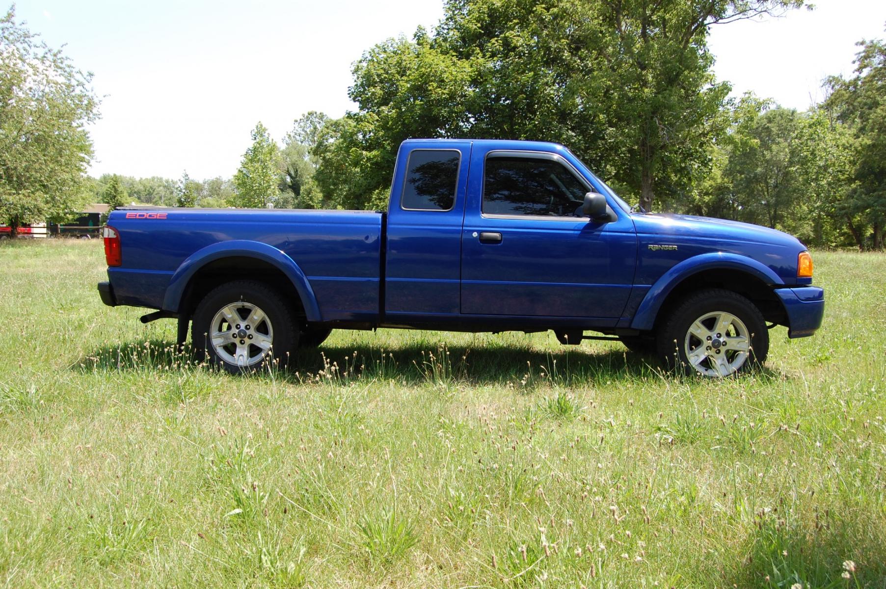 2005 Blue /Black/Gray cloth Ford Ranger Edge (1FTYR14U35P) with an 3.0L V6 OHV 12V engine, Automatic transmission, located at 6528 Lower York Road, New Hope, PA, 18938, (215) 862-9555, 40.358707, -74.977882 - Here for sale is a 2005 Ford Ranger superb Edge edition. Under the hood is a strong running 3.0 liter V6 which puts power to the rear wheels via it automatic transmission. Features include; Black/Gray cloth interior, cruise control, tilt steering wheel, cold AC, roll up windows, manual mirrors, ma - Photo #4