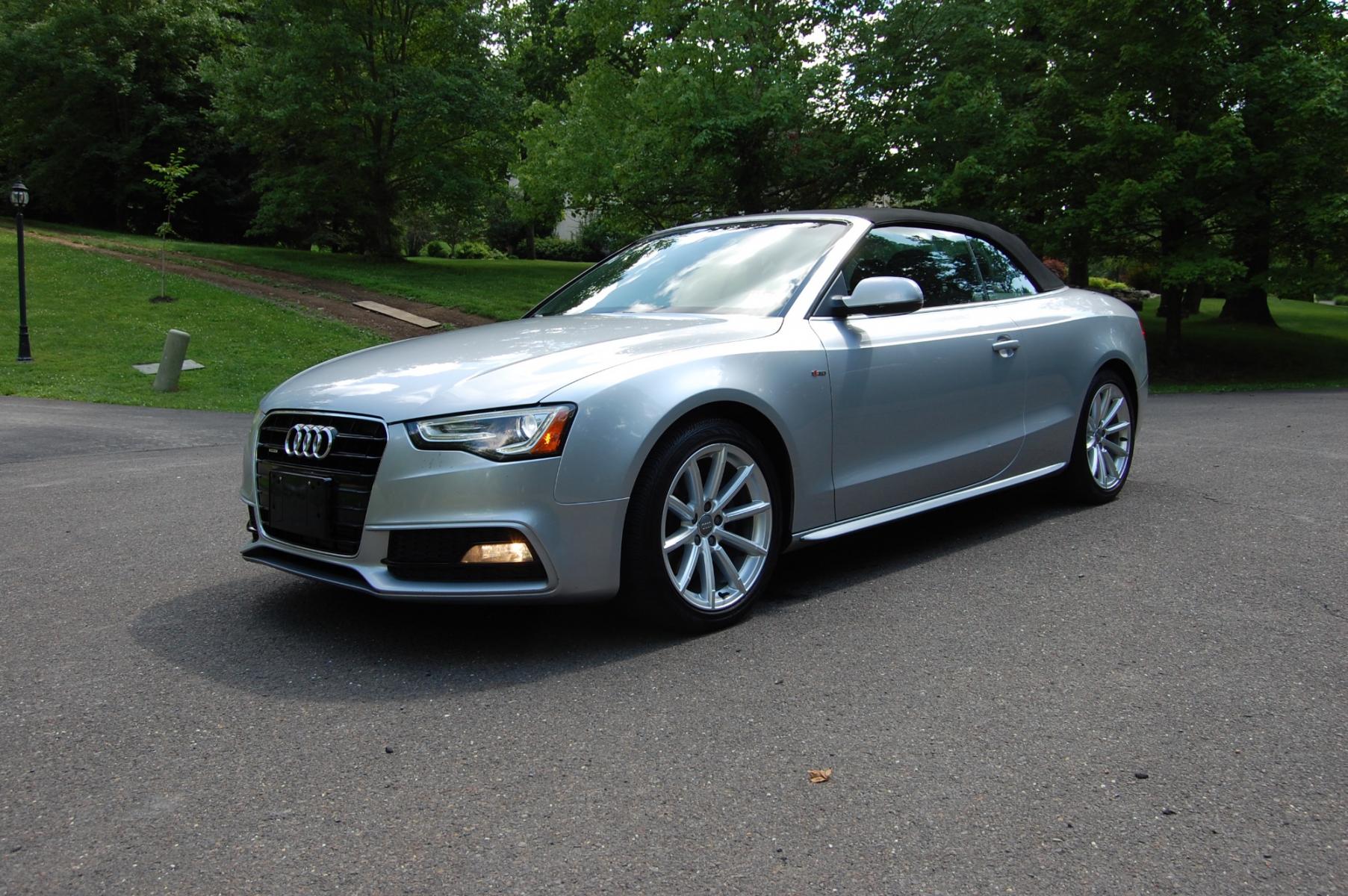 2015 Silver /Black Leather Audi A5 2.0T Premium Plus Cabriolet quattro (WAUMFAFH3FN) with an 2.0L L4 DOHC 16V TURBO engine, 8-Speed Automatic transmission, located at 6528 Lower York Road, New Hope, PA, 18938, (215) 862-9555, 40.358707, -74.977882 - Here we have a beautiful Audi A5 convertible with a 2.0L 4 cylinder turbo engine putting power to all 4 wheels via an automatic transmission. The interior offers black leather with aluminum trim, cruise control, tilt steering wheel, power windows/locks/mirrors, power top, power seats, heated seats, - Photo #0