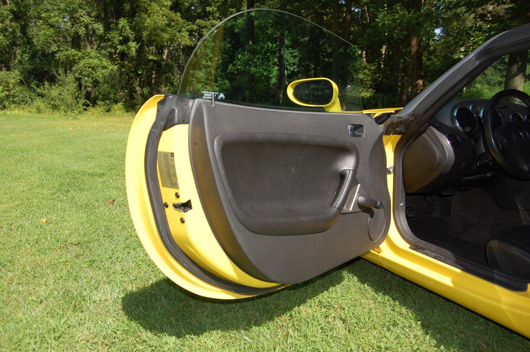 2007 Yellow /Black Leather Pontiac Solstice Base (1G2MB35B97Y) with an 2.4L L4 DOHC 16V engine, Manual transmission, located at 6528 Lower York Road, New Hope, PA, 18938, (215) 862-9555, 40.358707, -74.977882 - Here we have a Pontiac Solstice with a 2.4L 4 cylinder engine putting power to the rear wheels via a 5 speed manual transmission. The interior offers black leather, cruise control, tilt steering wheel, A/C, roll up windows, manual locks, AM/FM/CD/AUX radio, drivers/passengers front airbags for safet - Photo #19