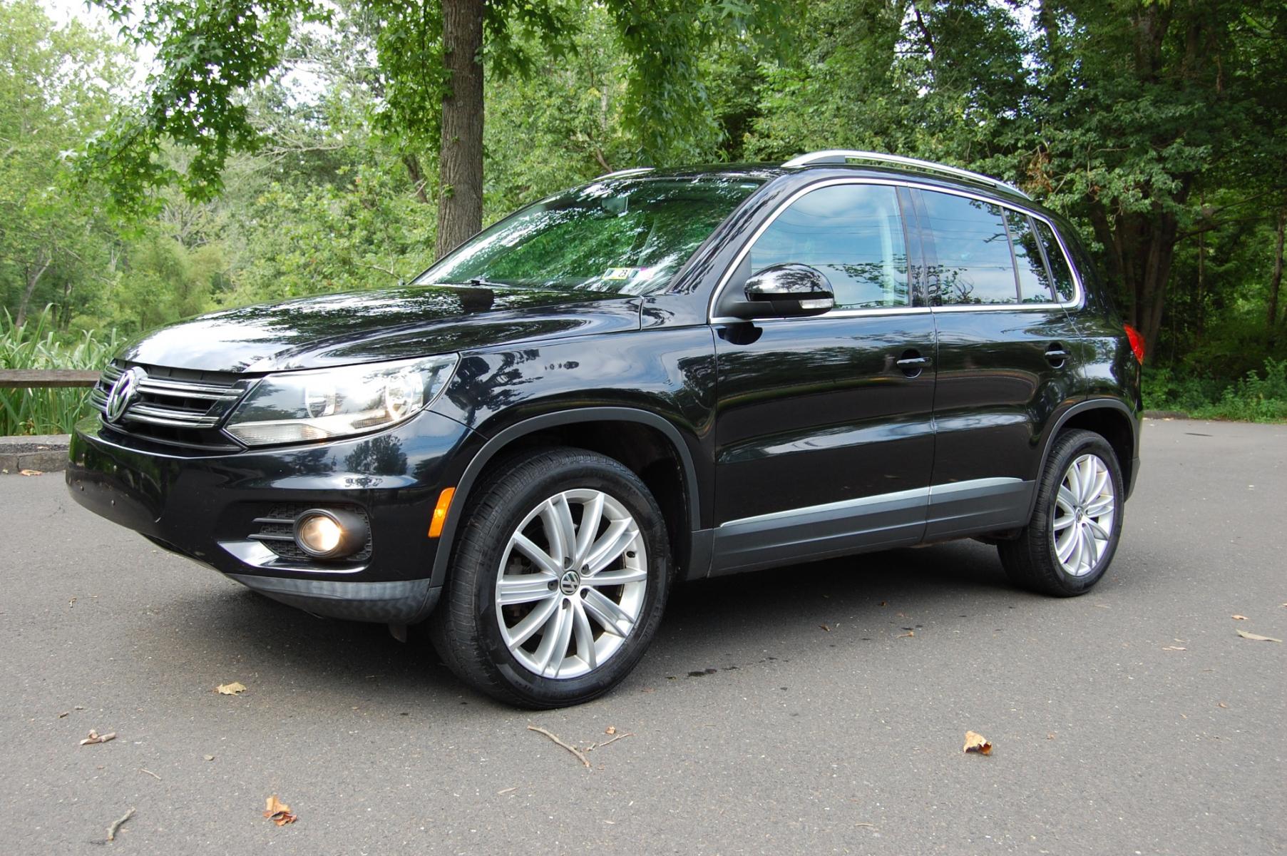 2012 Black /Black Leather Volkswagen Tiguan SE 4Motion (WVGBV7AX8CW) with an 2.0L L4 DOHC 16V TURBO engine, 6-Speed Automatic transmission, located at 6528 Lower York Road, New Hope, PA, 18938, (215) 862-9555, 40.358707, -74.977882 - Photo #1