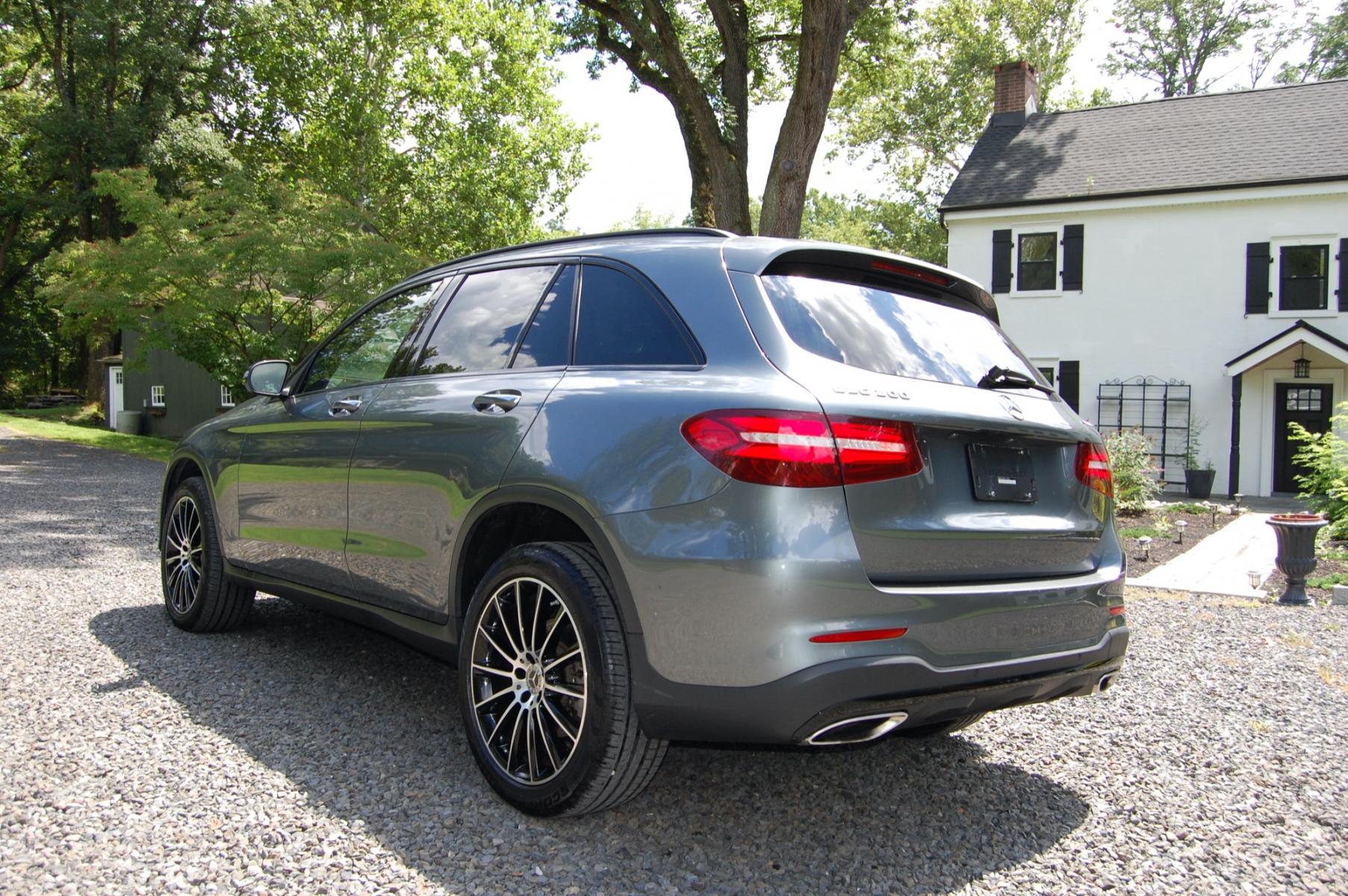 2019 Selenite Grey Metallic /Black Leather Mercedes-Benz GLC-Class GLC300 4MATIC (WDC0G4KB5KV) with an 2.0L L4 DOHC 16V TURBO engine, Automatic 9 Speed transmission, located at 6528 Lower York Road, New Hope, PA, 18938, (215) 862-9555, 40.358707, -74.977882 - Here we have a beautiful Mercedes GLC with a 2.0L Turbo 4 cylinder engine putting power to all four wheel via an automatic transmission. The interior offers black leather with wood trim, keyless entry, 2 master keys, cruise control, tilt steering wheel, power windows/locks/mirrors, power moving fron - Photo #2