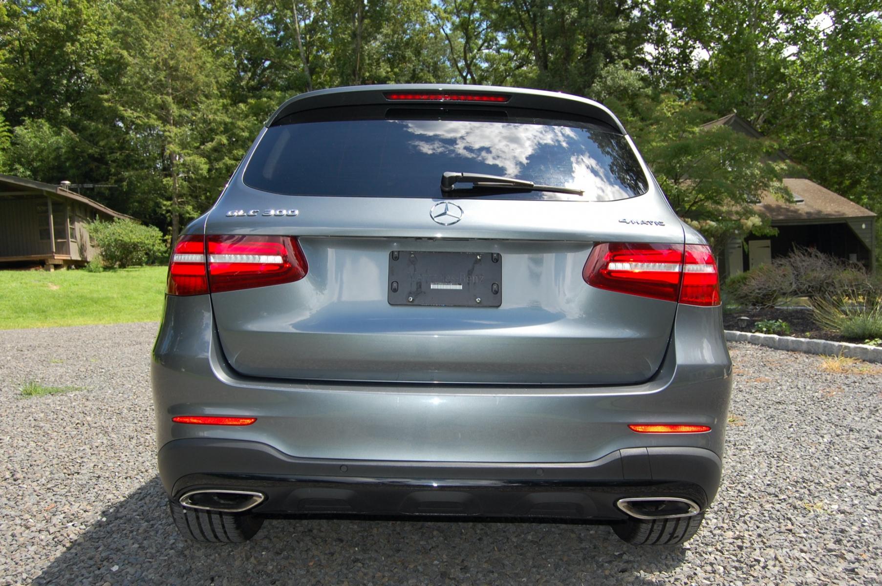 2019 Selenite Grey Metallic /Black Leather Mercedes-Benz GLC-Class GLC300 4MATIC (WDC0G4KB5KV) with an 2.0L L4 DOHC 16V TURBO engine, Automatic 9 Speed transmission, located at 6528 Lower York Road, New Hope, PA, 18938, (215) 862-9555, 40.358707, -74.977882 - Here we have a beautiful Mercedes GLC with a 2.0L Turbo 4 cylinder engine putting power to all four wheel via an automatic transmission. The interior offers black leather with wood trim, keyless entry, 2 master keys, cruise control, tilt steering wheel, power windows/locks/mirrors, power moving fron - Photo #3