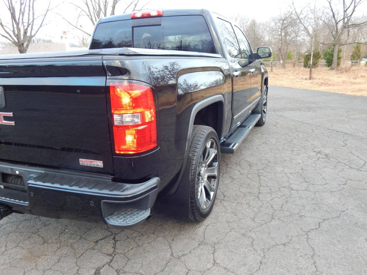 2014 Black /Black Leather GMC Sierra 1500 SLT Crew Cab 4WD (3GTU2VEC1EG) with an 5.3L V8 OHV 16V engine, 6-Speed Automatic transmission, located at 6528 Lower York Road, New Hope, PA, 18938, (215) 862-9555, 40.358707, -74.977882 - Here we have a beautiful GMC Sierra All Terrain 1500 SLT with a 5.3L V8 putting power to the ground via a 4x4 automatic transmission. Options include: black leather, keyless entry, 2 keys, cruise control, tilt steering wheel, AM/FM/CD/BLUETOOTH, navigation, back up camera, heated steering wheel, pow - Photo#3