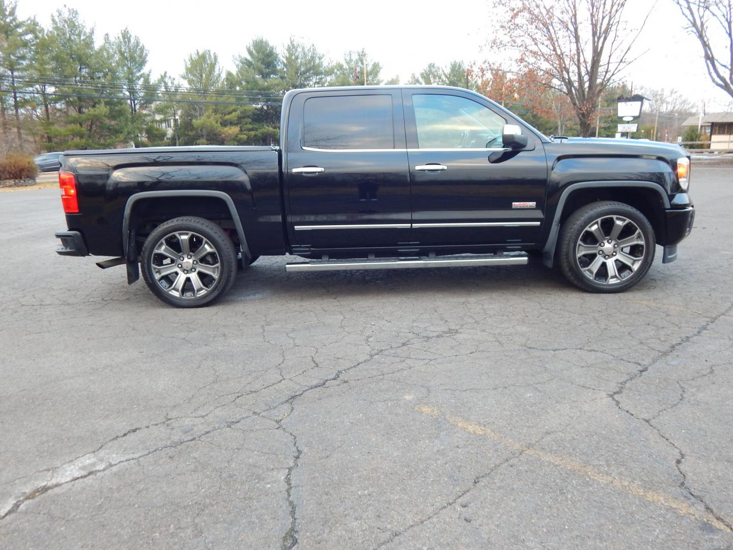 2014 Black /Black Leather GMC Sierra 1500 SLT Crew Cab 4WD (3GTU2VEC1EG) with an 5.3L V8 OHV 16V engine, 6-Speed Automatic transmission, located at 6528 Lower York Road, New Hope, PA, 18938, (215) 862-9555, 40.358707, -74.977882 - Here we have a beautiful GMC Sierra All Terrain 1500 SLT with a 5.3L V8 putting power to the ground via a 4x4 automatic transmission. Options include: black leather, keyless entry, 2 keys, cruise control, tilt steering wheel, AM/FM/CD/BLUETOOTH, navigation, back up camera, heated steering wheel, pow - Photo#6