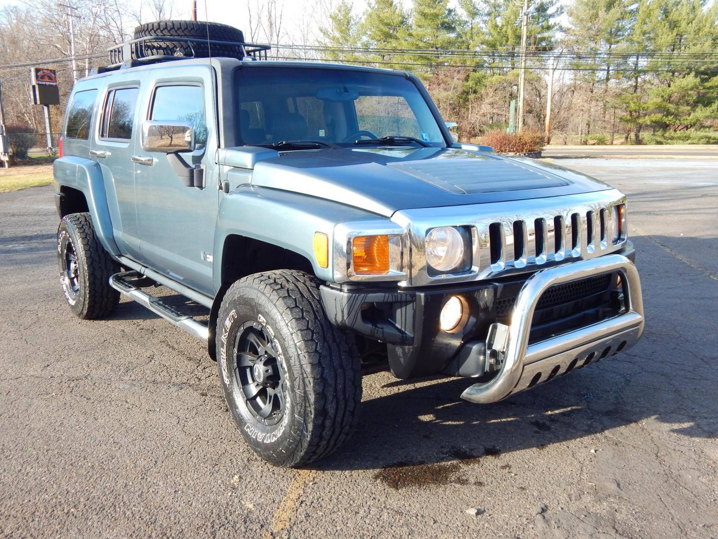 2007 Blue /Black Leather Hummer H3 Adventure (5GTDN13E778) with an 3.7L L5 DOHC 20V engine, Automatic transmission, located at 6528 Lower York Road, New Hope, PA, 18938, (215) 862-9555, 40.358707, -74.977882 - Here we have a very nice Hummer H3 Adventure package with a 3.7L inline 5 cylinder putting power to an 4x4 automatic transmission. Options include: black leather, AC/heat, AM/FM/CD radio, tilt steering wheel, power windows/locks/mirrors, automatic headlights, locking rear differential, Raceline whee - Photo#4