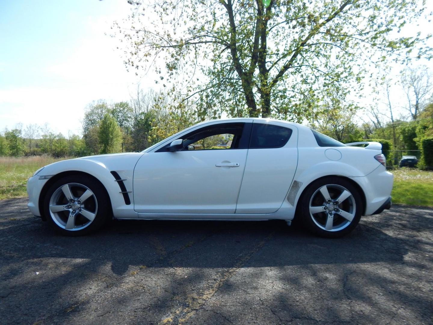 2005 White /Black Cloth Mazda RX-8 6-Speed (JM1FE173650) with an 1.3L L2 ROTARY engine, Manual transmission, located at 6528 Lower York Road, New Hope, PA, 18938, (215) 862-9555, 40.358707, -74.977882 - Here we have a Mazda RX-8 with a 1.3L Rotary engine putting power to the rear wheels via a smooth shifting 6 speed manual transmission. Options include: black cloth, AM/FM/CD/TAPE radio, tilt steering wheel, cruise control, power windows/locks/mirrors, sunroof, dual aftermarket exhaust, aftermarket - Photo#1