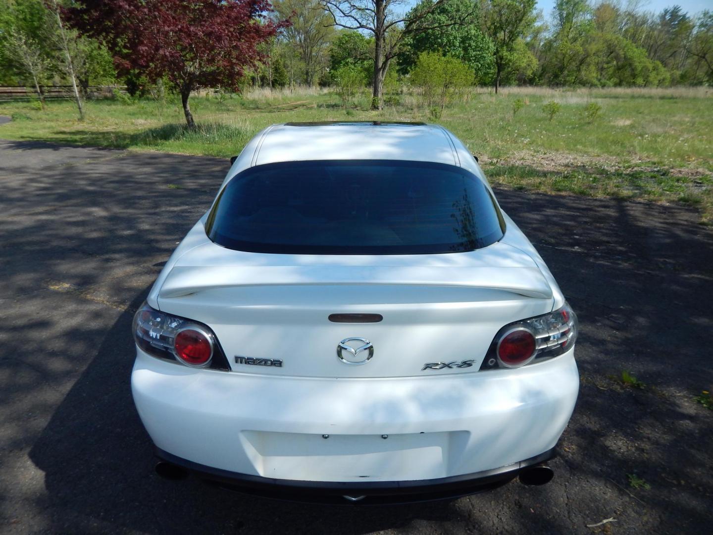2005 White /Black Cloth Mazda RX-8 6-Speed (JM1FE173650) with an 1.3L L2 ROTARY engine, Manual transmission, located at 6528 Lower York Road, New Hope, PA, 18938, (215) 862-9555, 40.358707, -74.977882 - Here we have a Mazda RX-8 with a 1.3L Rotary engine putting power to the rear wheels via a smooth shifting 6 speed manual transmission. Options include: black cloth, AM/FM/CD/TAPE radio, tilt steering wheel, cruise control, power windows/locks/mirrors, sunroof, dual aftermarket exhaust, aftermarket - Photo#4