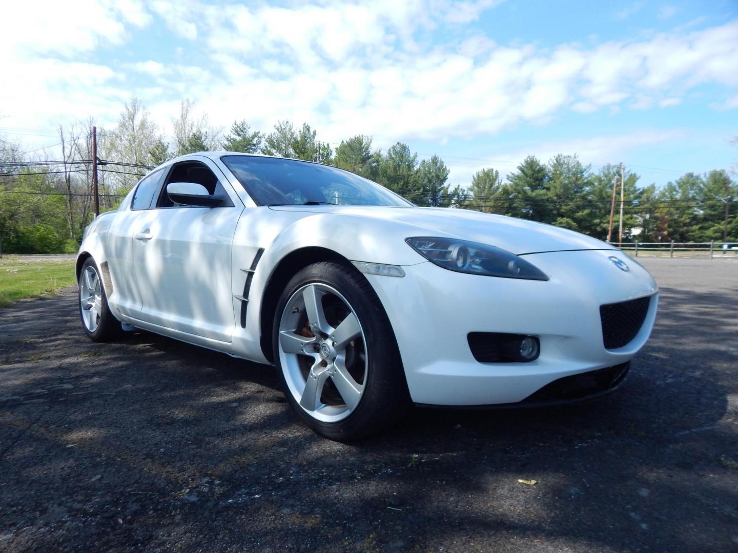 2005 White /Black Cloth Mazda RX-8 6-Speed (JM1FE173650) with an 1.3L L2 ROTARY engine, Manual transmission, located at 6528 Lower York Road, New Hope, PA, 18938, (215) 862-9555, 40.358707, -74.977882 - Here we have a Mazda RX-8 with a 1.3L Rotary engine putting power to the rear wheels via a smooth shifting 6 speed manual transmission. Options include: black cloth, AM/FM/CD/TAPE radio, tilt steering wheel, cruise control, power windows/locks/mirrors, sunroof, dual aftermarket exhaust, aftermarket - Photo#7