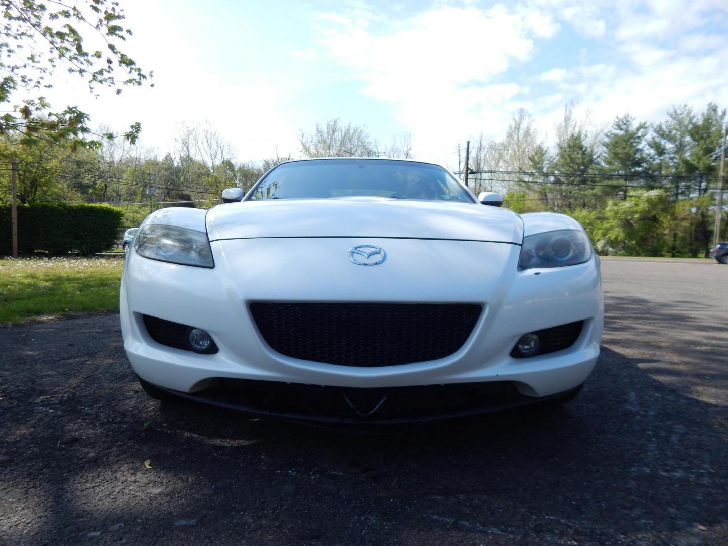 2005 White /Black Cloth Mazda RX-8 6-Speed (JM1FE173650) with an 1.3L L2 ROTARY engine, Manual transmission, located at 6528 Lower York Road, New Hope, PA, 18938, (215) 862-9555, 40.358707, -74.977882 - Here we have a Mazda RX-8 with a 1.3L Rotary engine putting power to the rear wheels via a smooth shifting 6 speed manual transmission. Options include: black cloth, AM/FM/CD/TAPE radio, tilt steering wheel, cruise control, power windows/locks/mirrors, sunroof, dual aftermarket exhaust, aftermarket - Photo#8