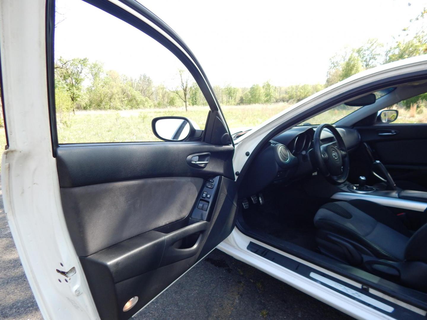 2005 White /Black Cloth Mazda RX-8 6-Speed (JM1FE173650) with an 1.3L L2 ROTARY engine, Manual transmission, located at 6528 Lower York Road, New Hope, PA, 18938, (215) 862-9555, 40.358707, -74.977882 - Here we have a Mazda RX-8 with a 1.3L Rotary engine putting power to the rear wheels via a smooth shifting 6 speed manual transmission. Options include: black cloth, AM/FM/CD/TAPE radio, tilt steering wheel, cruise control, power windows/locks/mirrors, sunroof, dual aftermarket exhaust, aftermarket - Photo#10