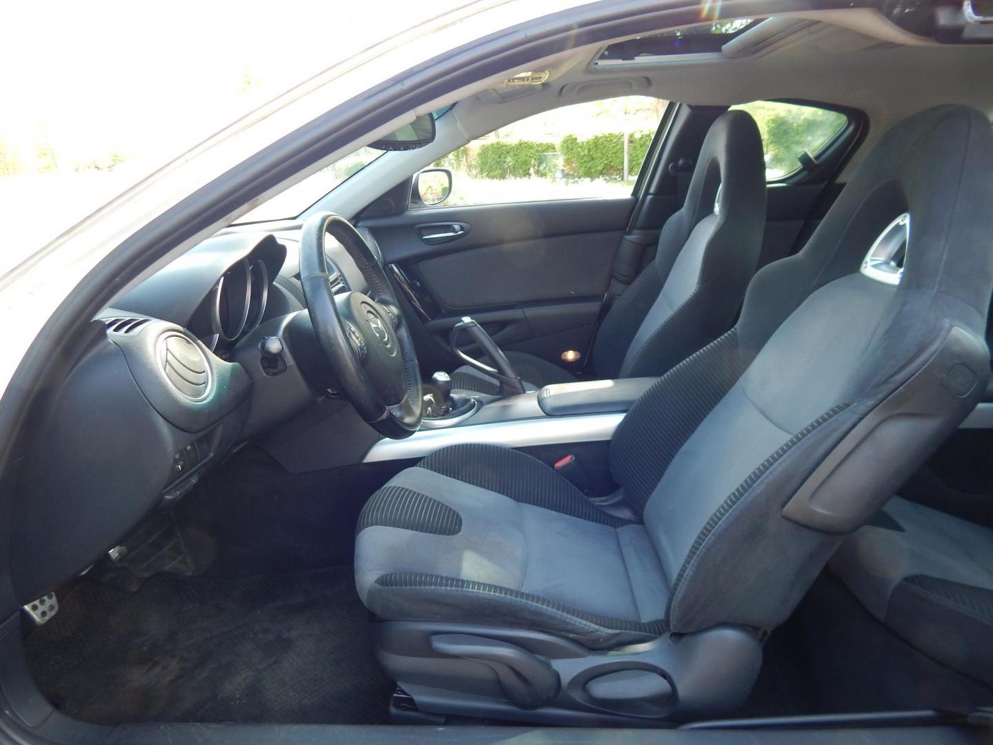 2005 White /Black Cloth Mazda RX-8 6-Speed (JM1FE173650) with an 1.3L L2 ROTARY engine, Manual transmission, located at 6528 Lower York Road, New Hope, PA, 18938, (215) 862-9555, 40.358707, -74.977882 - Here we have a Mazda RX-8 with a 1.3L Rotary engine putting power to the rear wheels via a smooth shifting 6 speed manual transmission. Options include: black cloth, AM/FM/CD/TAPE radio, tilt steering wheel, cruise control, power windows/locks/mirrors, sunroof, dual aftermarket exhaust, aftermarket - Photo#11