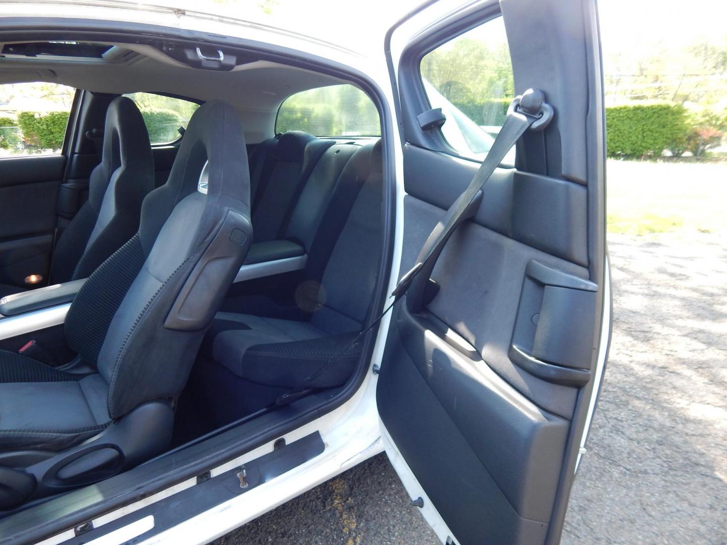 2005 White /Black Cloth Mazda RX-8 6-Speed (JM1FE173650) with an 1.3L L2 ROTARY engine, Manual transmission, located at 6528 Lower York Road, New Hope, PA, 18938, (215) 862-9555, 40.358707, -74.977882 - Here we have a Mazda RX-8 with a 1.3L Rotary engine putting power to the rear wheels via a smooth shifting 6 speed manual transmission. Options include: black cloth, AM/FM/CD/TAPE radio, tilt steering wheel, cruise control, power windows/locks/mirrors, sunroof, dual aftermarket exhaust, aftermarket - Photo#12