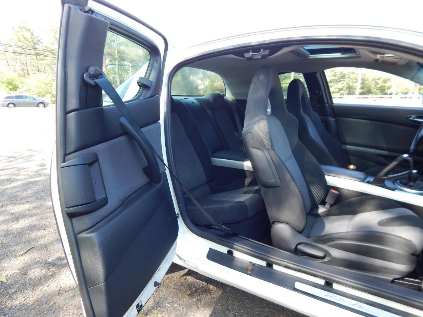 2005 White /Black Cloth Mazda RX-8 6-Speed (JM1FE173650) with an 1.3L L2 ROTARY engine, Manual transmission, located at 6528 Lower York Road, New Hope, PA, 18938, (215) 862-9555, 40.358707, -74.977882 - Here we have a Mazda RX-8 with a 1.3L Rotary engine putting power to the rear wheels via a smooth shifting 6 speed manual transmission. Options include: black cloth, AM/FM/CD/TAPE radio, tilt steering wheel, cruise control, power windows/locks/mirrors, sunroof, dual aftermarket exhaust, aftermarket - Photo#19