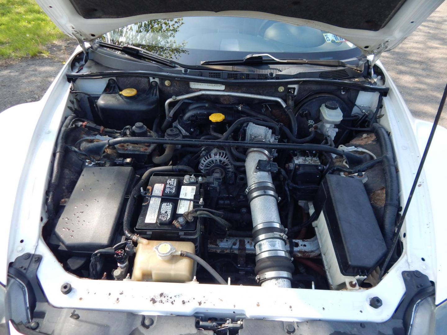 2005 White /Black Cloth Mazda RX-8 6-Speed (JM1FE173650) with an 1.3L L2 ROTARY engine, Manual transmission, located at 6528 Lower York Road, New Hope, PA, 18938, (215) 862-9555, 40.358707, -74.977882 - Here we have a Mazda RX-8 with a 1.3L Rotary engine putting power to the rear wheels via a smooth shifting 6 speed manual transmission. Options include: black cloth, AM/FM/CD/TAPE radio, tilt steering wheel, cruise control, power windows/locks/mirrors, sunroof, dual aftermarket exhaust, aftermarket - Photo#25