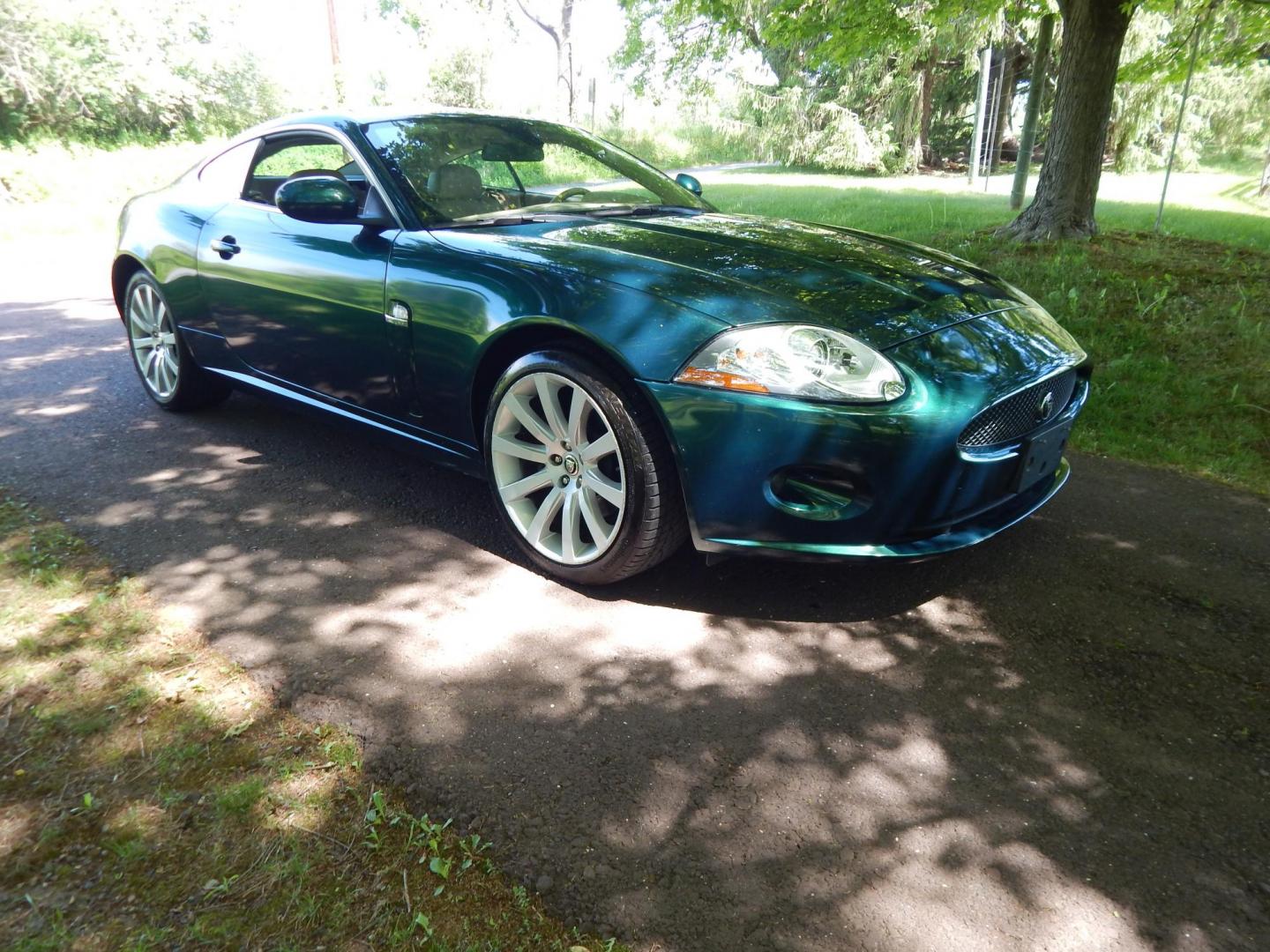 2008 Green /Tan Jaguar XK-Series XK Coupe (SAJWA43B285) with an 4.2L V8 DOHC 32V engine, 6-Speed Automatic Overdrive transmission, located at 6528 Lower York Road, New Hope, PA, 18938, (215) 862-9555, 40.358707, -74.977882 - Here we have a 2008 Jaguar XK with a 4.2L V8 putting power to the rear wheels via a smooth shifting automatic transmission. Options include: tan leather with wood trim, front power seats with memory, push button start, dual climate controls, heated front seats, navigation, AM/FM/CD/SAT radio with Al - Photo#33