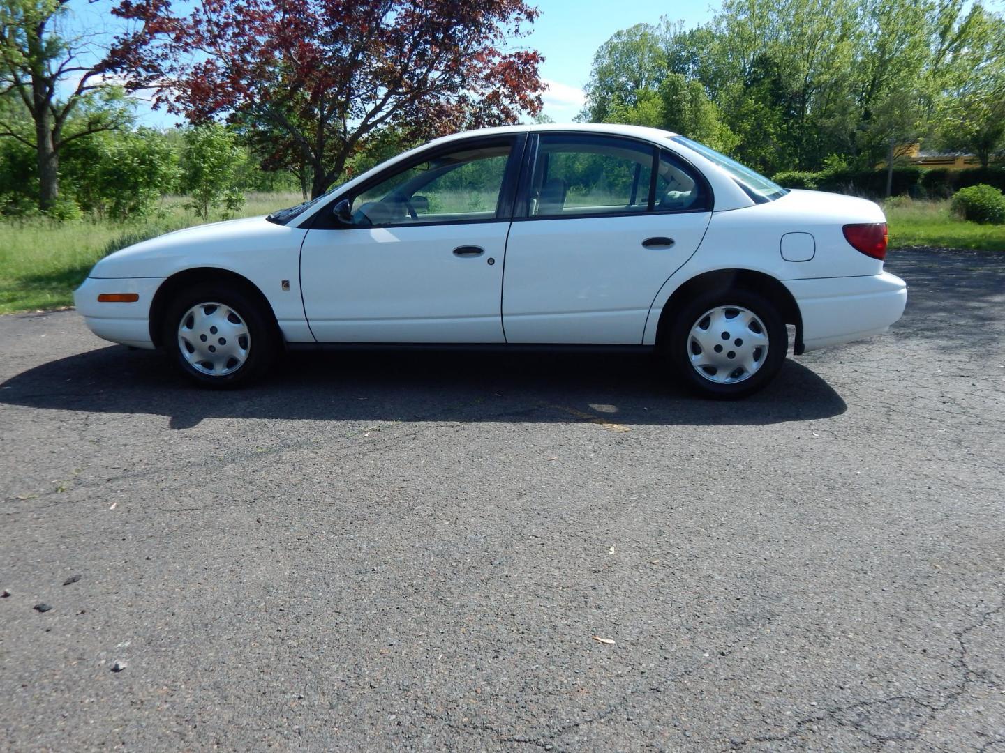 2002 White /Tan Saturn SL SL1 (1G8ZH52872Z) with an 1.9L L4 SOHC 8V engine, 4-Speed Automatic Overdrive transmission, located at 6528 Lower York Road, New Hope, PA, 18938, (215) 862-9555, 40.358707, -74.977882 - Here we have a very clean, one owner, low miles, Saturn SL1 with a 1.9L 4 cylinder engine putting power to the front wheels via an automatic transmission. Options include: tan cloth, manual moving seats, tilt steering wheel, roll up windows, cold AC, heat, manual locks, manual adjusting side view mi - Photo#1