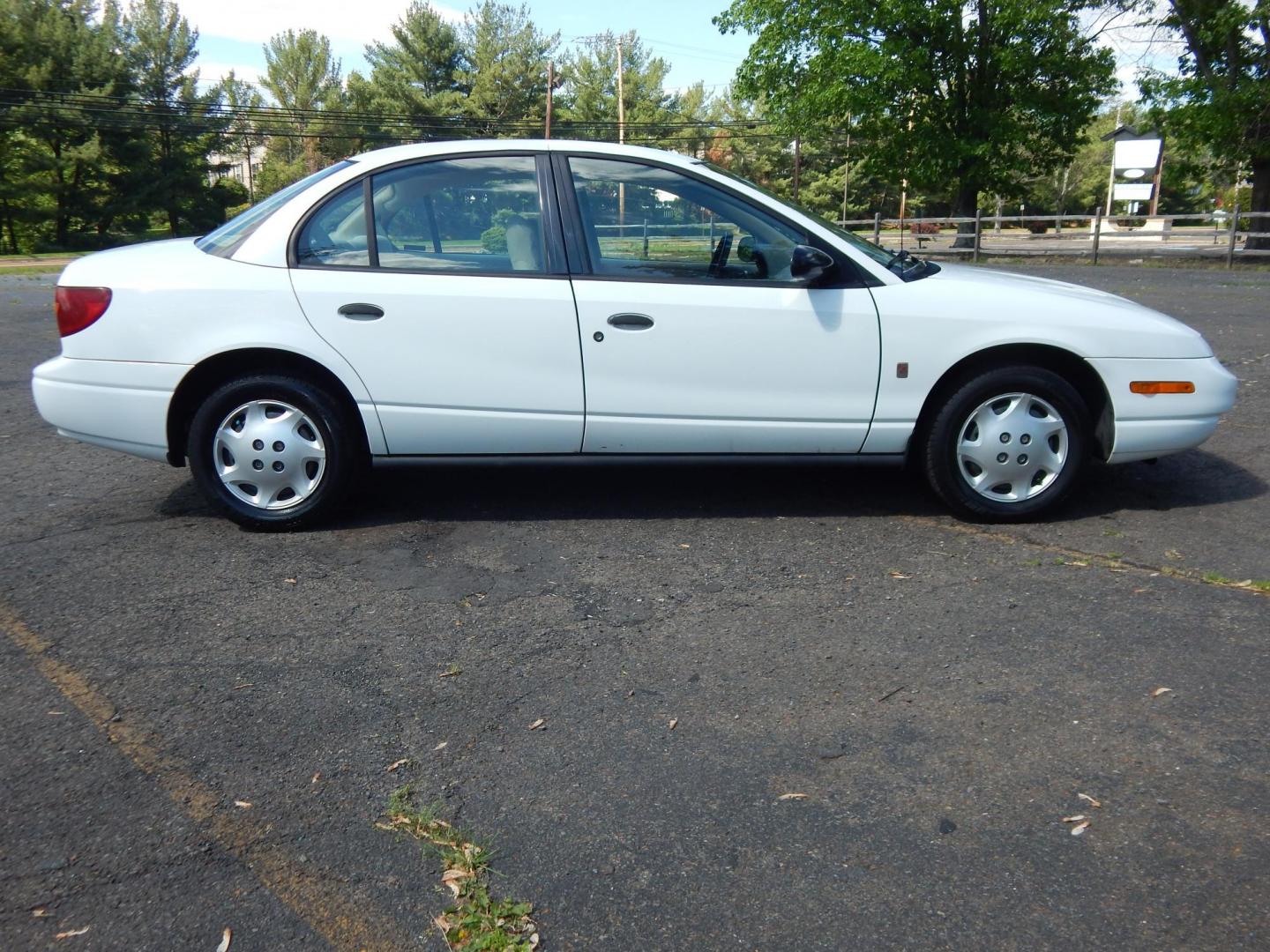 2002 White /Tan Saturn SL SL1 (1G8ZH52872Z) with an 1.9L L4 SOHC 8V engine, 4-Speed Automatic Overdrive transmission, located at 6528 Lower York Road, New Hope, PA, 18938, (215) 862-9555, 40.358707, -74.977882 - Here we have a very clean, one owner, low miles, Saturn SL1 with a 1.9L 4 cylinder engine putting power to the front wheels via an automatic transmission. Options include: tan cloth, manual moving seats, tilt steering wheel, roll up windows, cold AC, heat, manual locks, manual adjusting side view mi - Photo#4