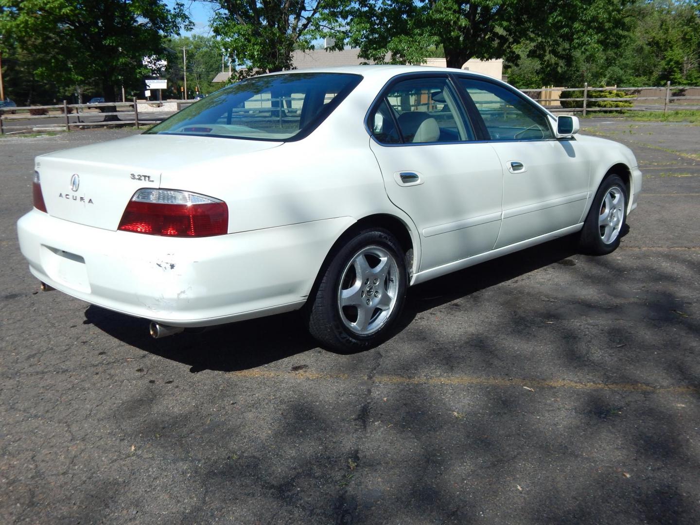 2003 White /Tan Acura TL 3.2TL (19UUA56633A) with an 3.2L V6 SOHC 24V engine, 5-Speed Automatic Overdrive transmission, located at 6528 Lower York Road, New Hope, PA, 18938, (215) 862-9555, 40.358707, -74.977882 - Here we have a Acura TL with a 3.2L V6 putting power to the front wheels via a smooth shifting automatic transmission. Options include: tan leather with wood trim, dual power seats, drivers memory seats, heated front seats, AC and heat, AM/FM/CD/TAPE radio, cruise control, sunroof, tilt steering whe - Photo#3