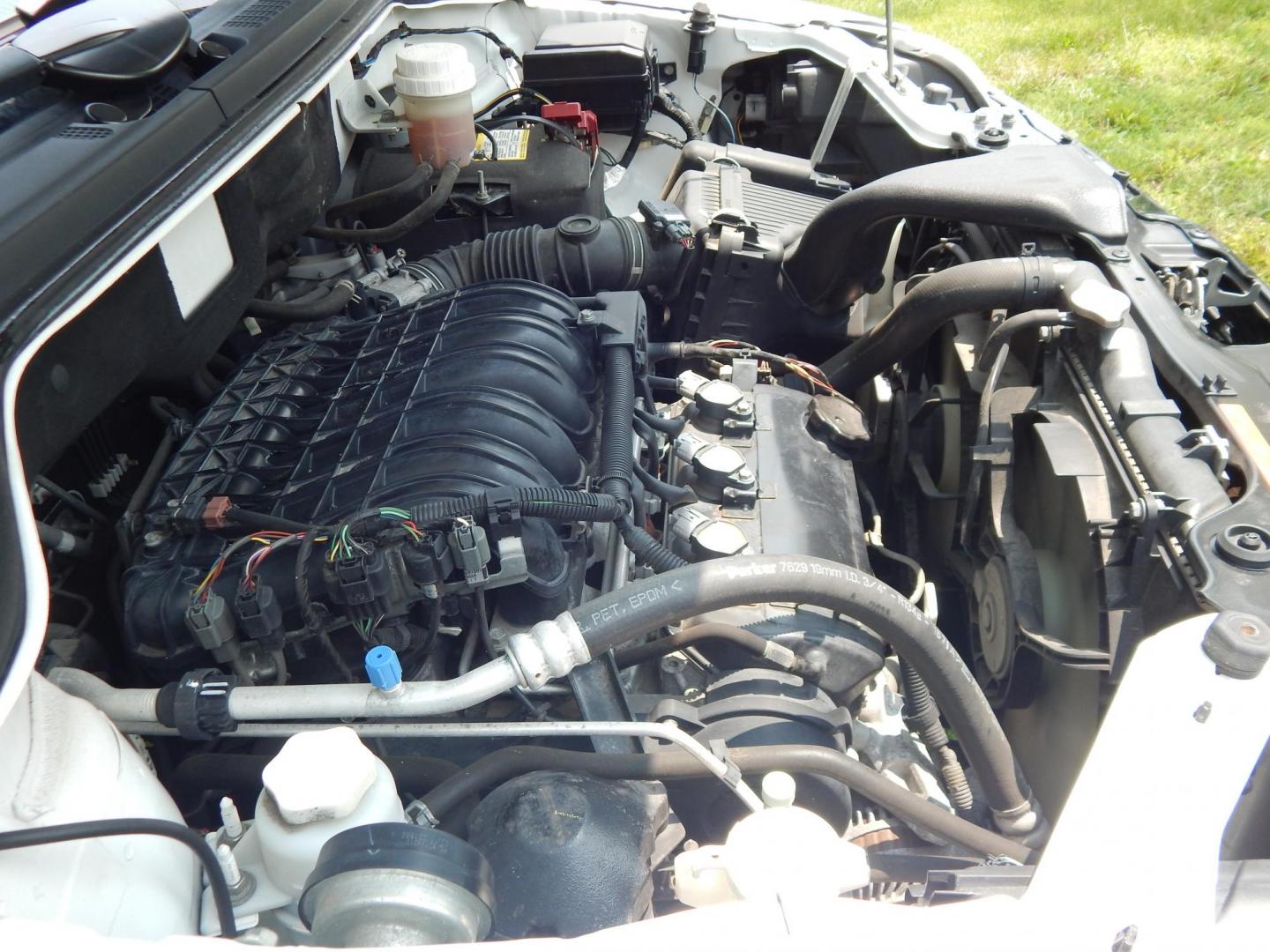 2011 White /Black Mitsubishi Endeavor LS AWD (4A4JN2AS8BE) with an 3.8L V6 SOHC 24V engine, 4-Speed Automatic transmission, located at 6528 Lower York Road, New Hope, PA, 18938, (215) 862-9555, 40.358707, -74.977882 - Here we have a very clean Mitsubishi Endeavor with a 3.8L V6 putting power to all four wheels via a smooth shifting automatic transmission. Options include: manual moving front seats, AC/heat, AM/FM/CD radio, cruise control, fog lights, power windows/locks, tilt steering wheel, roof rails, 17 inch a - Photo#19
