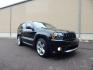 2007 Black /Gray Jeep Grand Cherokee SRT-8 (1J8HR78337C) with an 6.1L V8 OHV 16V engine, 5-Speed Automatic Overdrive transmission, located at 6528 Lower York Road, New Hope, PA, 18938, (215) 862-9555, 40.358707, -74.977882 - Here we have a very fun to drive, ONE OWNER, Jeep Grand Cherokee SRT8 with a 6.1L V8 putting power to all four wheels via a smooth shifting automatic transmission. Options include: gray leather, dual power seats, heated front seats, adjustable peddles, dual climate control, am/fm/cd/mp3, Boston Prem - Photo#0