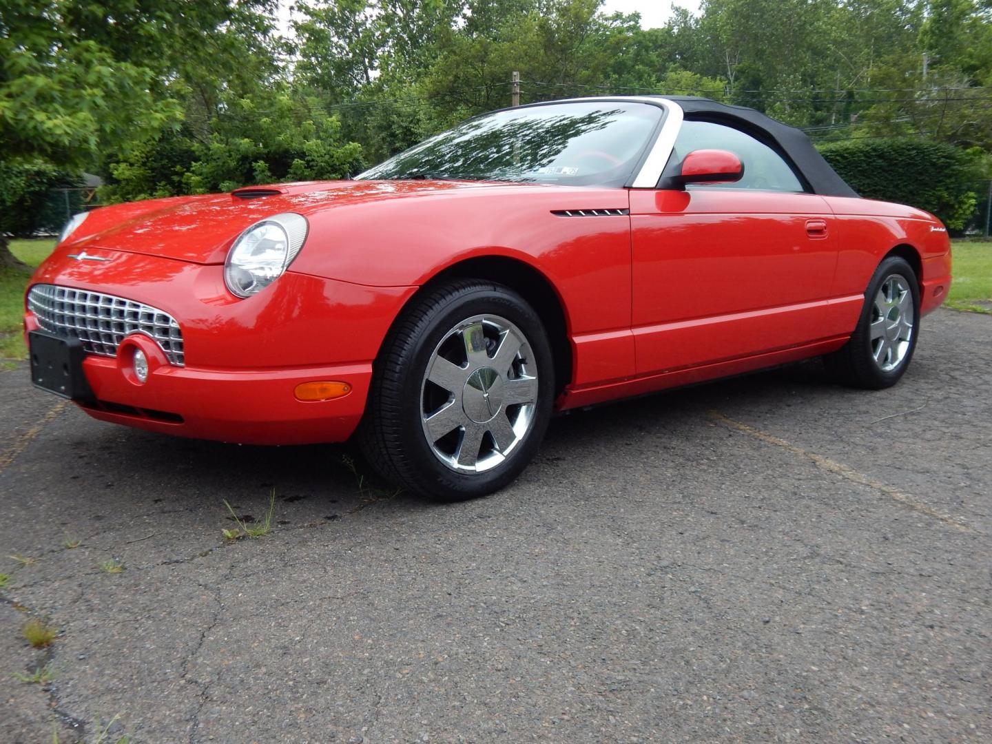 2002 Red /Red Ford Thunderbird Deluxe (1FAHP60A62Y) with an 3.9L V8 DOHC 32V engine, 5-Speed Automatic Overdrive transmission, located at 6528 Lower York Road, New Hope, PA, 18938, (215) 862-9555, 40.358707, -74.977882 - Here we have a beautifully kept, 14,XXX original miles, one owner Ford Thunderbird Deluxe with a 3.9L V8 putting power to the rear wheels via a smooth shifting automatic transmission. This vehicle has a clean Carfax reporting no accidents and one owner! Garage kept its whole life. All servicing done - Photo#0